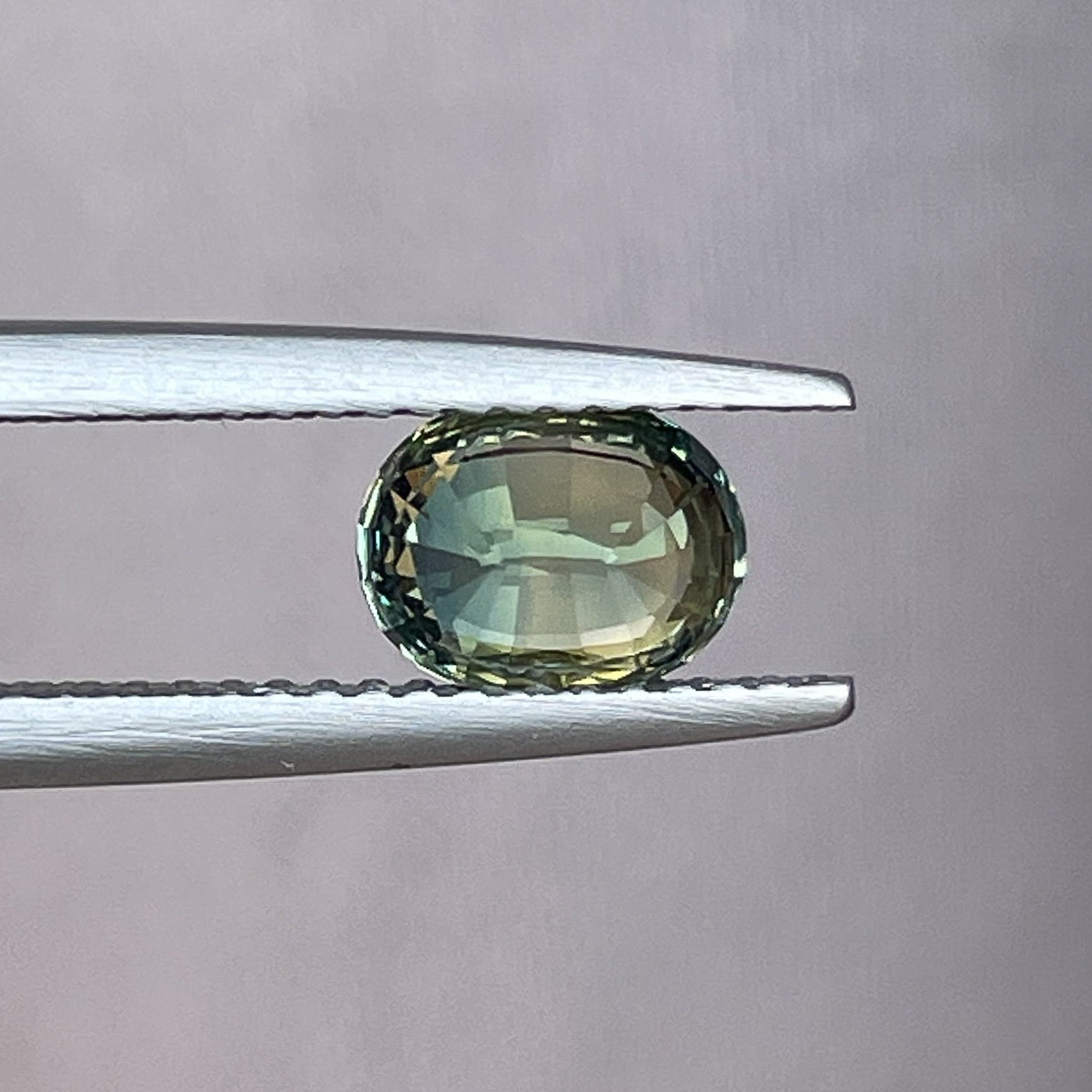 Natural teal green sapphire, 1.45 Ct oval cut loose gemstone by NASHGEMS, ideal for engagement rings or custom jewelry.