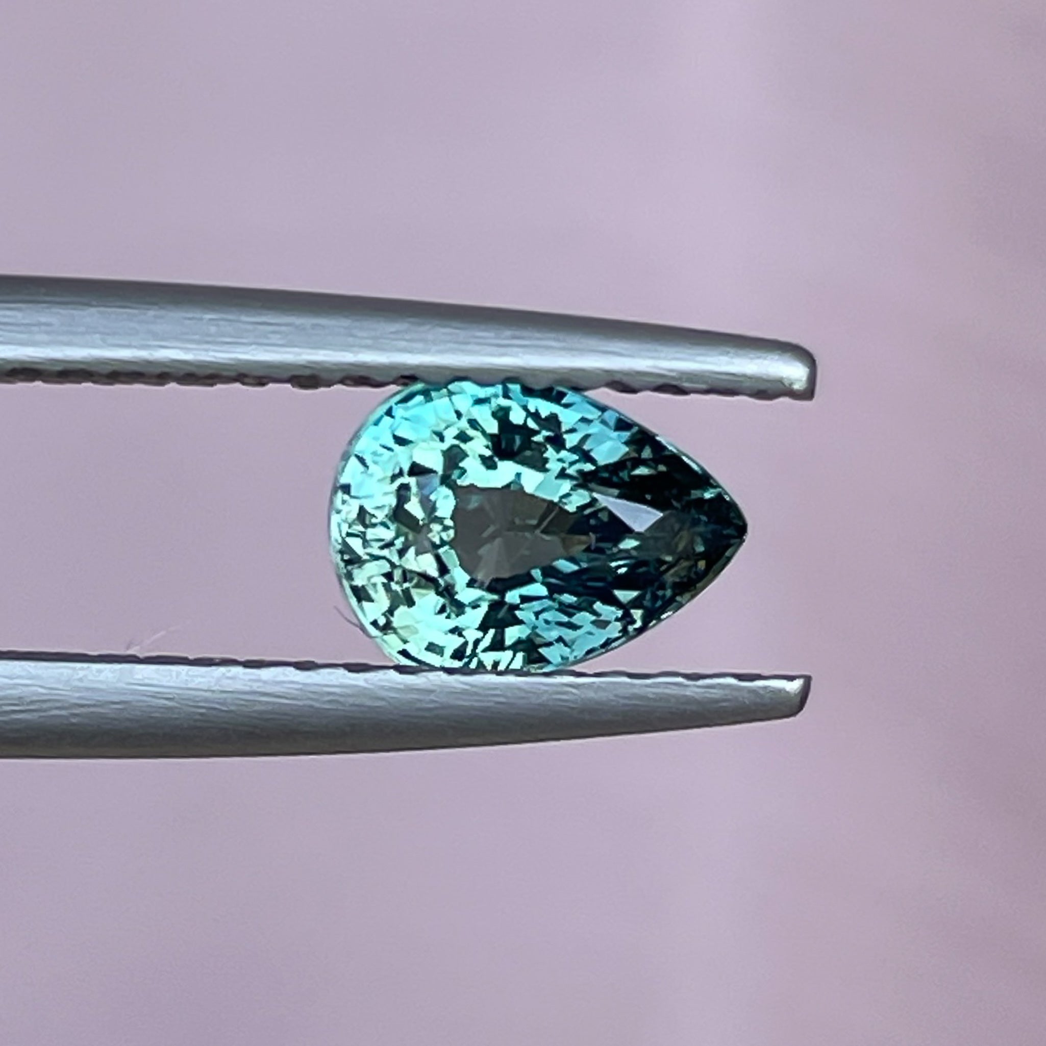 Teal sapphire loose gemstone in pear shape, 1.09 Ct, heated natural sapphire for jewelry, from NASHGEMS.