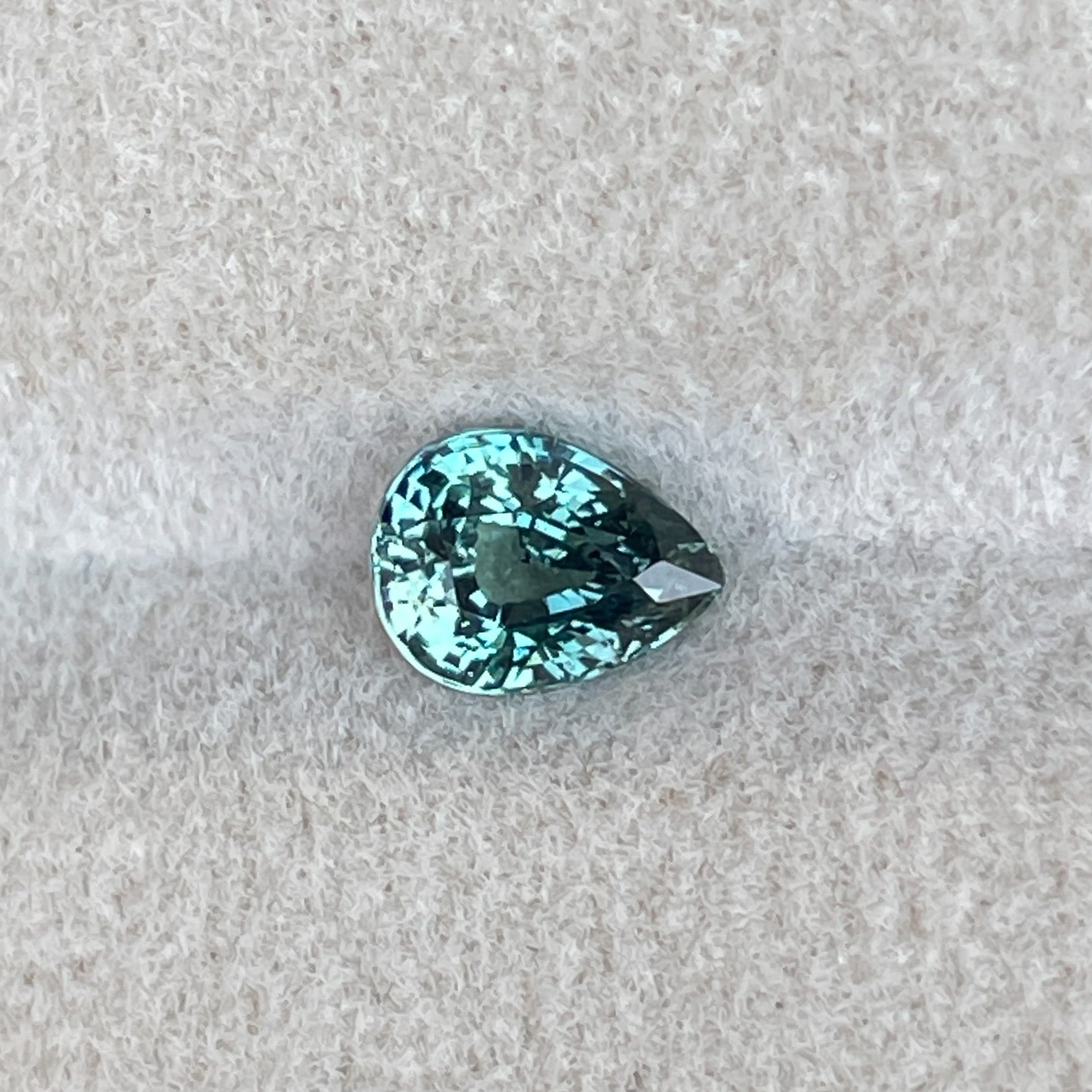 Natural teal sapphire loose gemstone 1.09 Ct in pear shape, perfect for pendants or custom jewelry by NASHGEMS.