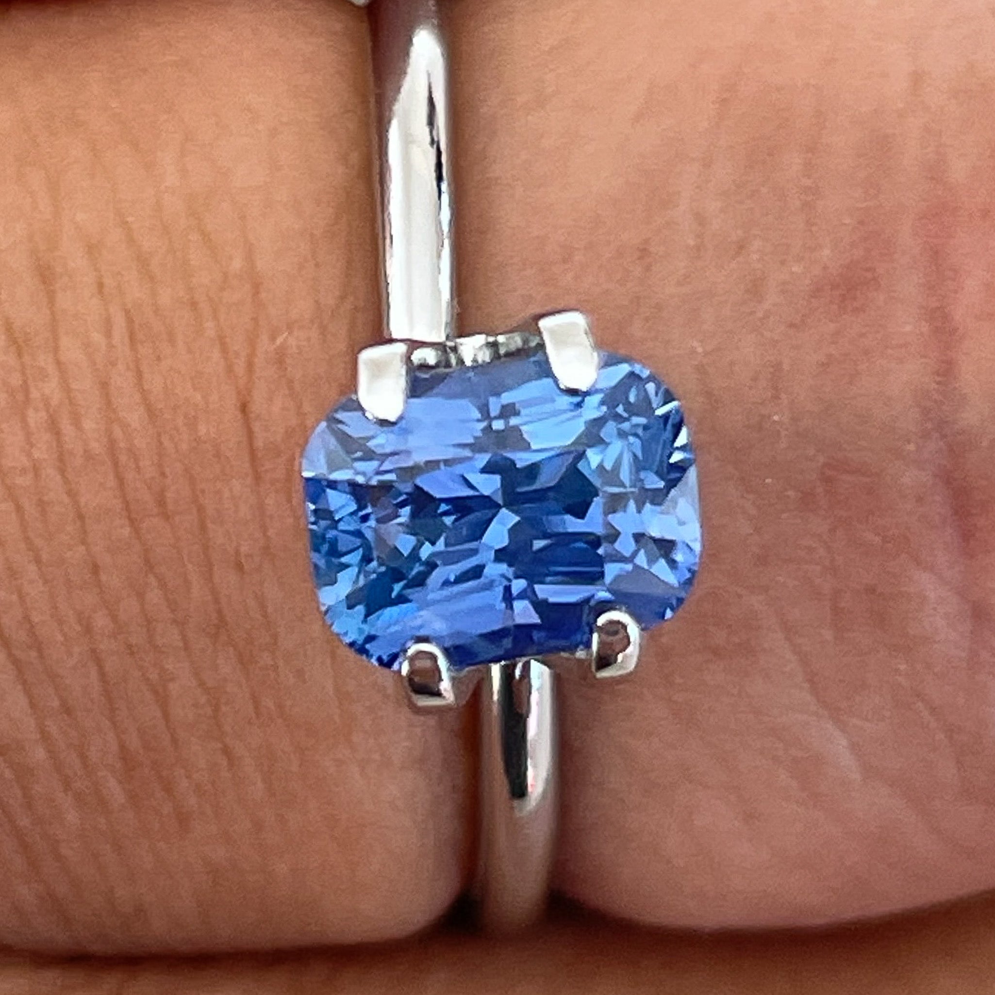 Natural Ceylon Blue Sapphire 1.60 Ct cushion cut, vivid blue loose gemstone by NASHGEMS for engagement or custom jewelry.