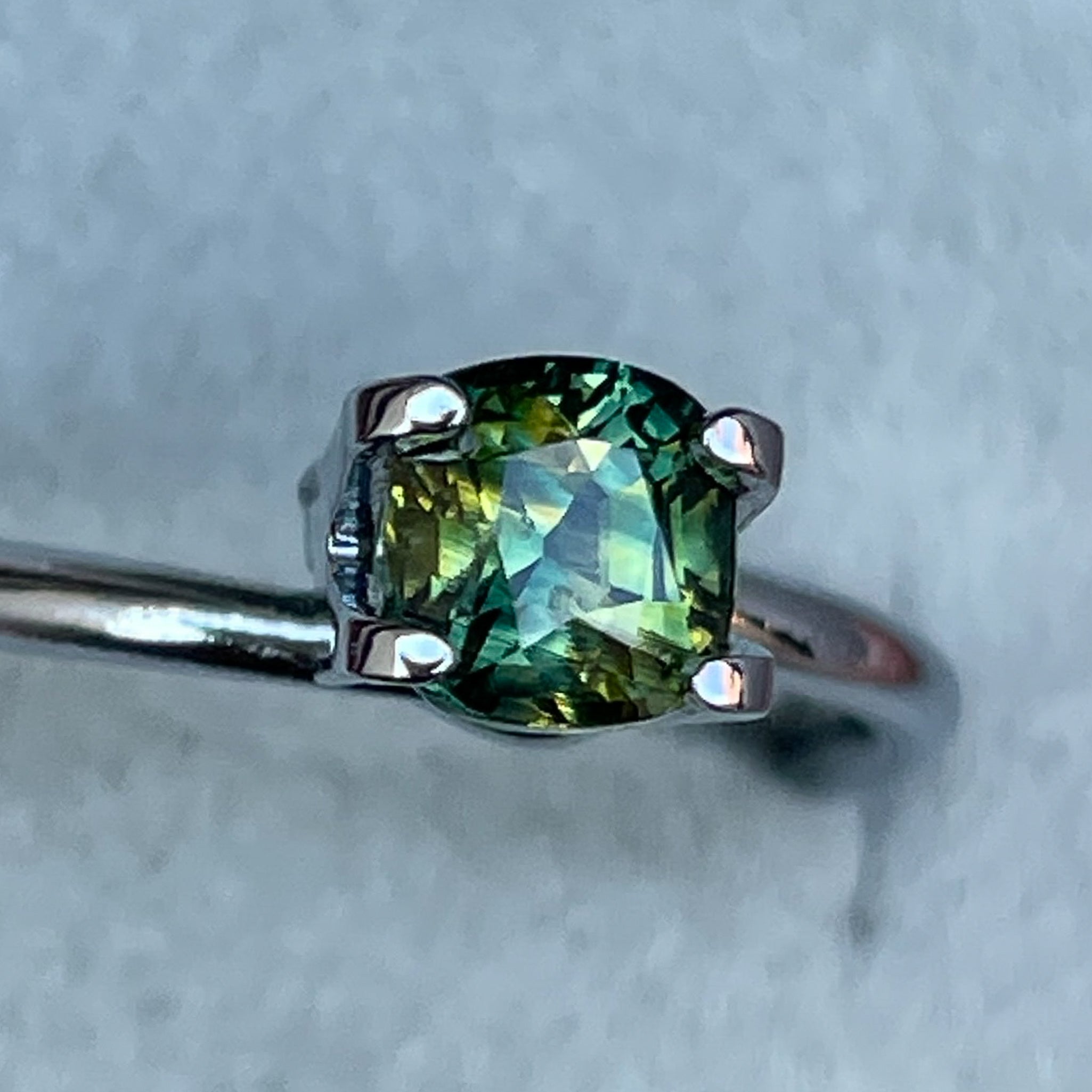 Teal Australian Parti Sapphire 1.10 Ct cushion cut loose gemstone by NASHGEMS, ideal for engagement rings or custom jewelry.