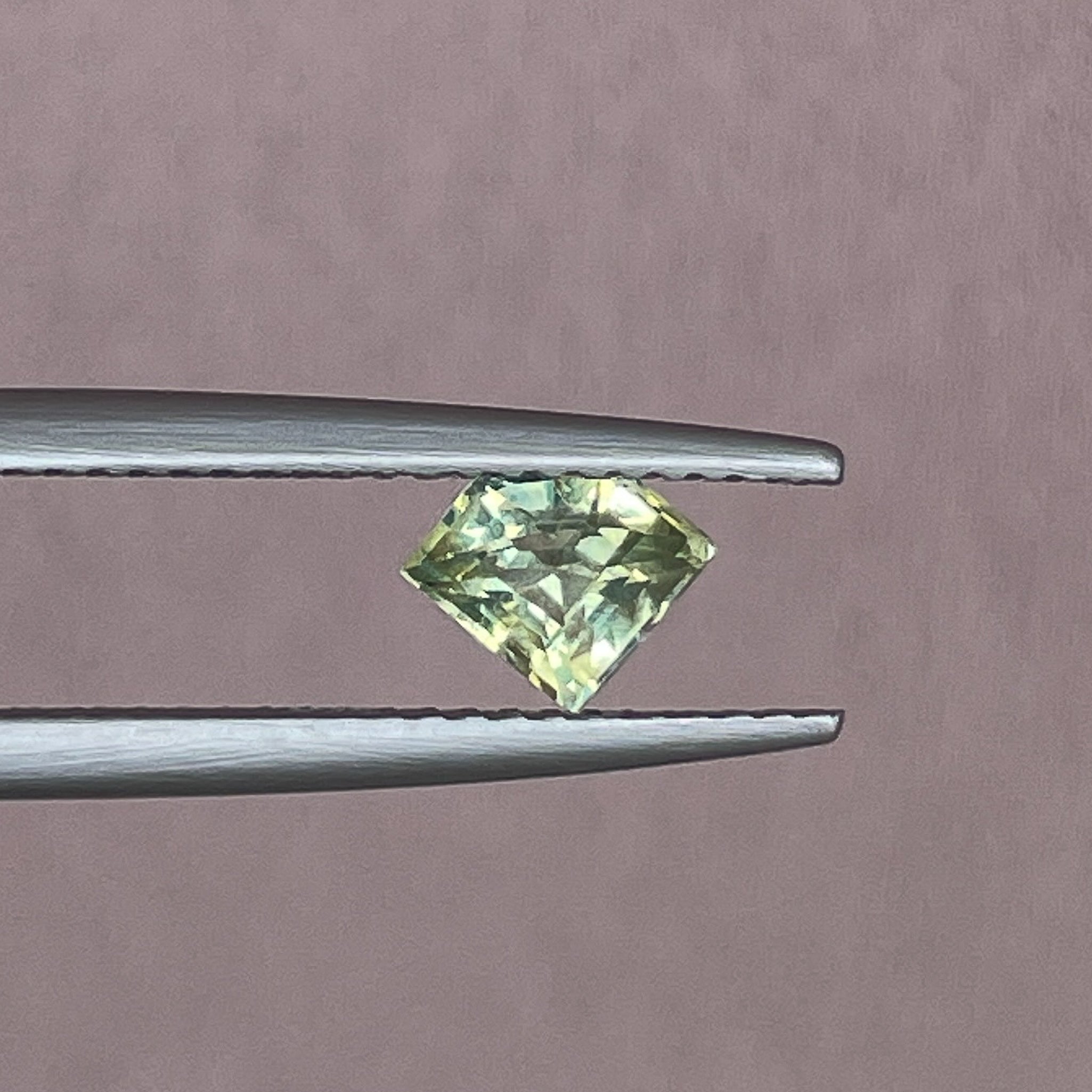 Natural pale green yellow sapphire, 0.72 Ct shield cut teal sapphire by NASHGEMS, loose gemstone for jewelry or engagement rings.