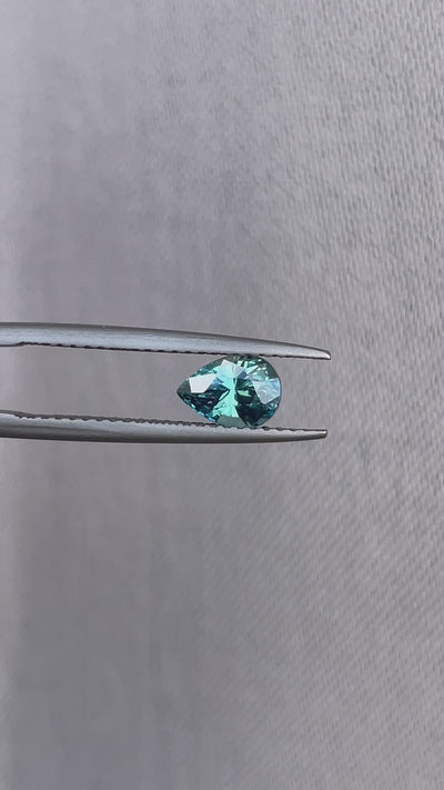 teal sapphire engagement ring