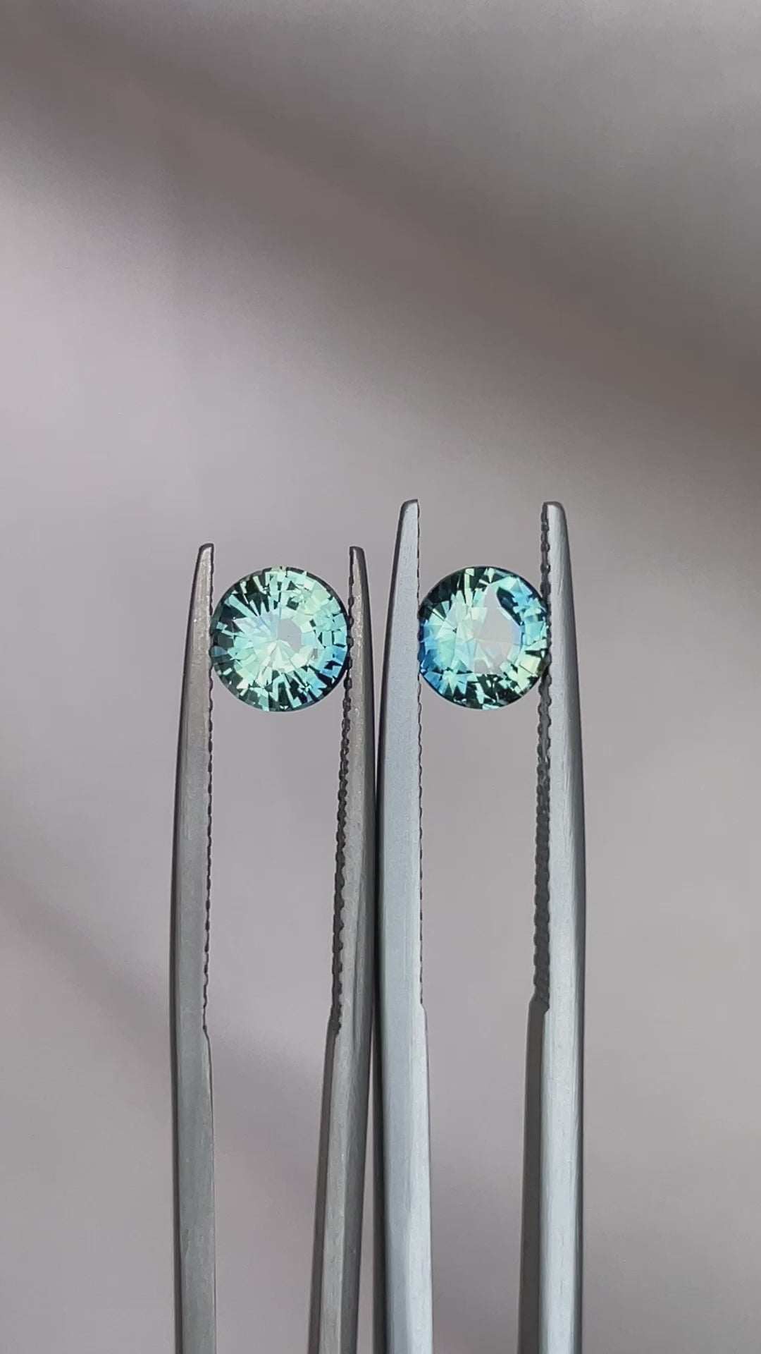 Blue green teal sapphire round pair