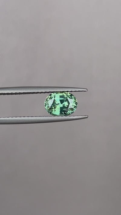 teal blue green parti sapphire oval cut gem 