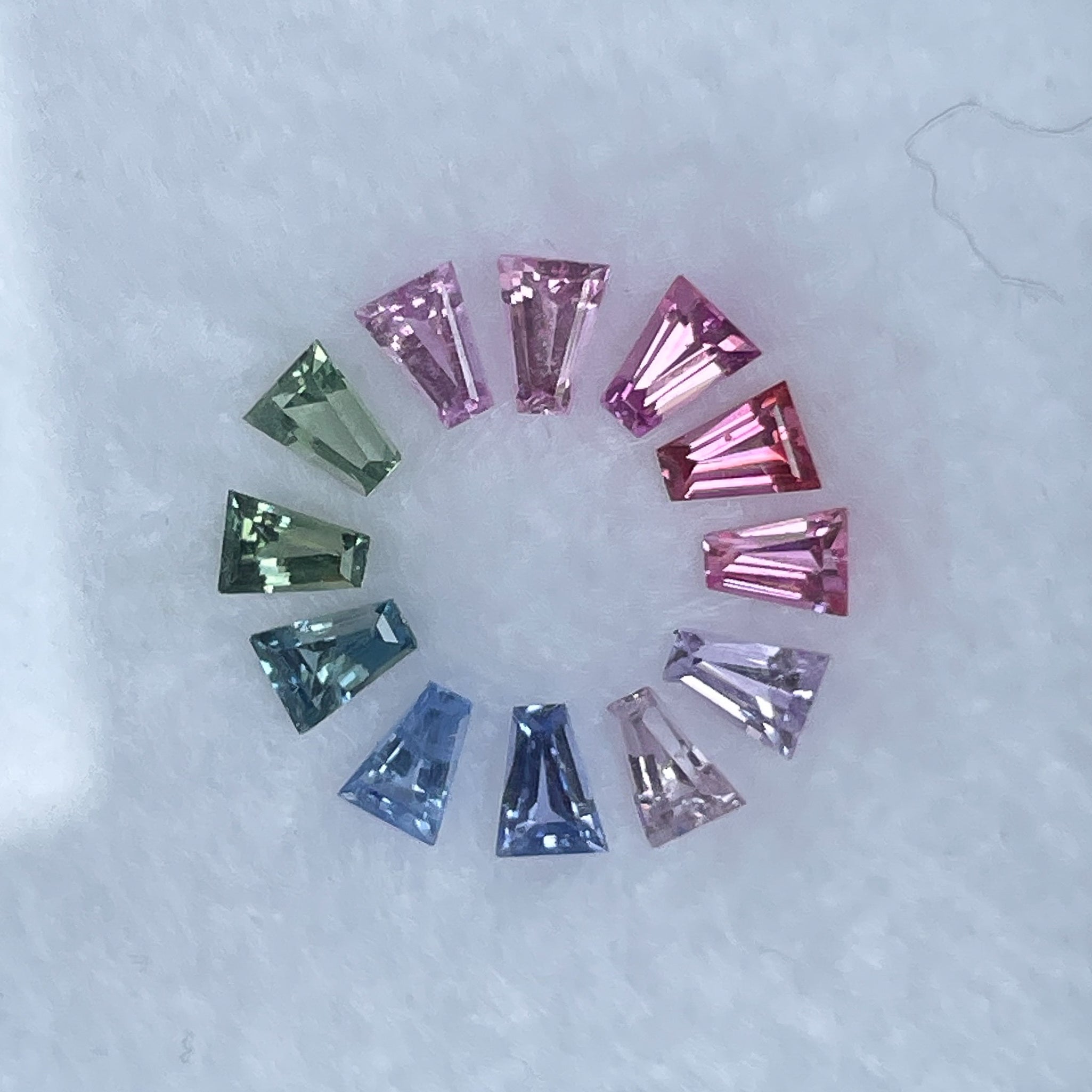 Natural rainbow sapphire lot with 1.37 carats of multi-colored loose sapphires for custom jewelry by NASHGEMS.
