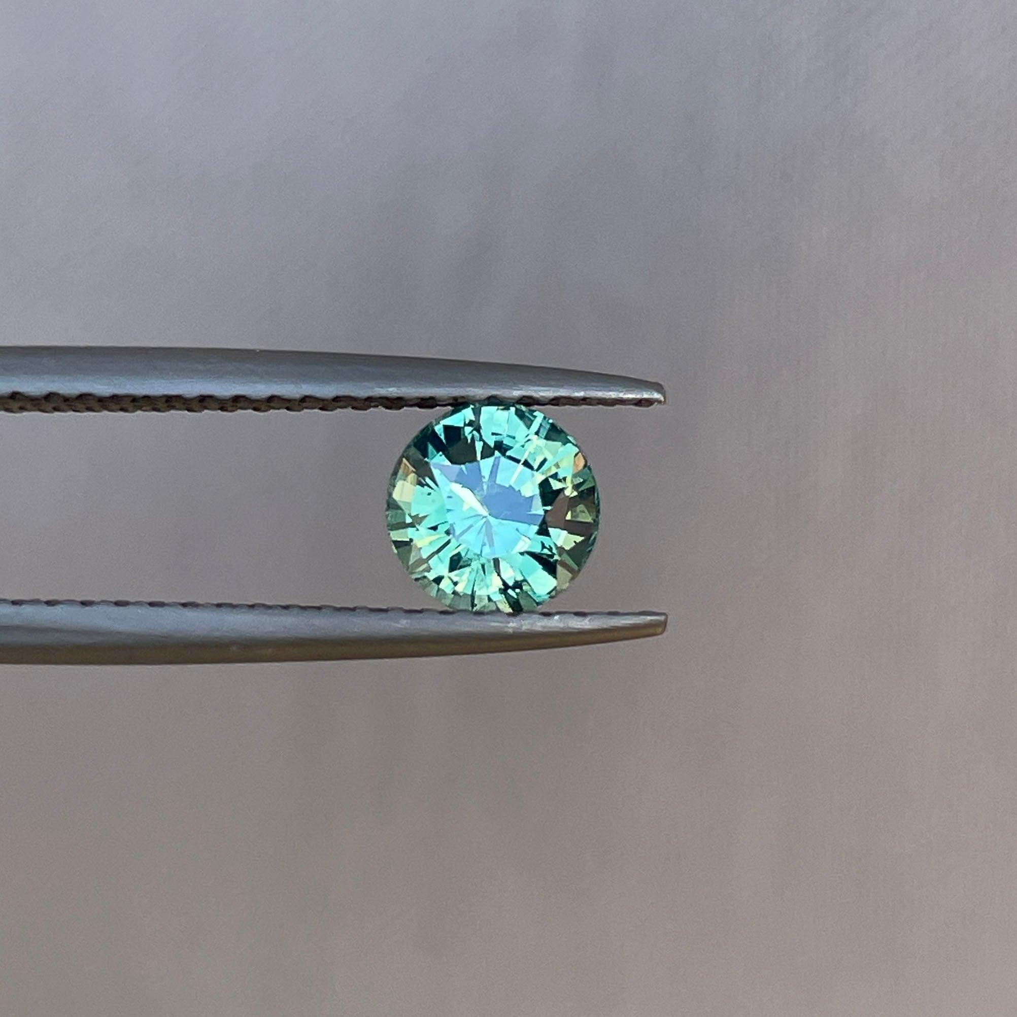 teal blue green parti sapphire round cut gem 