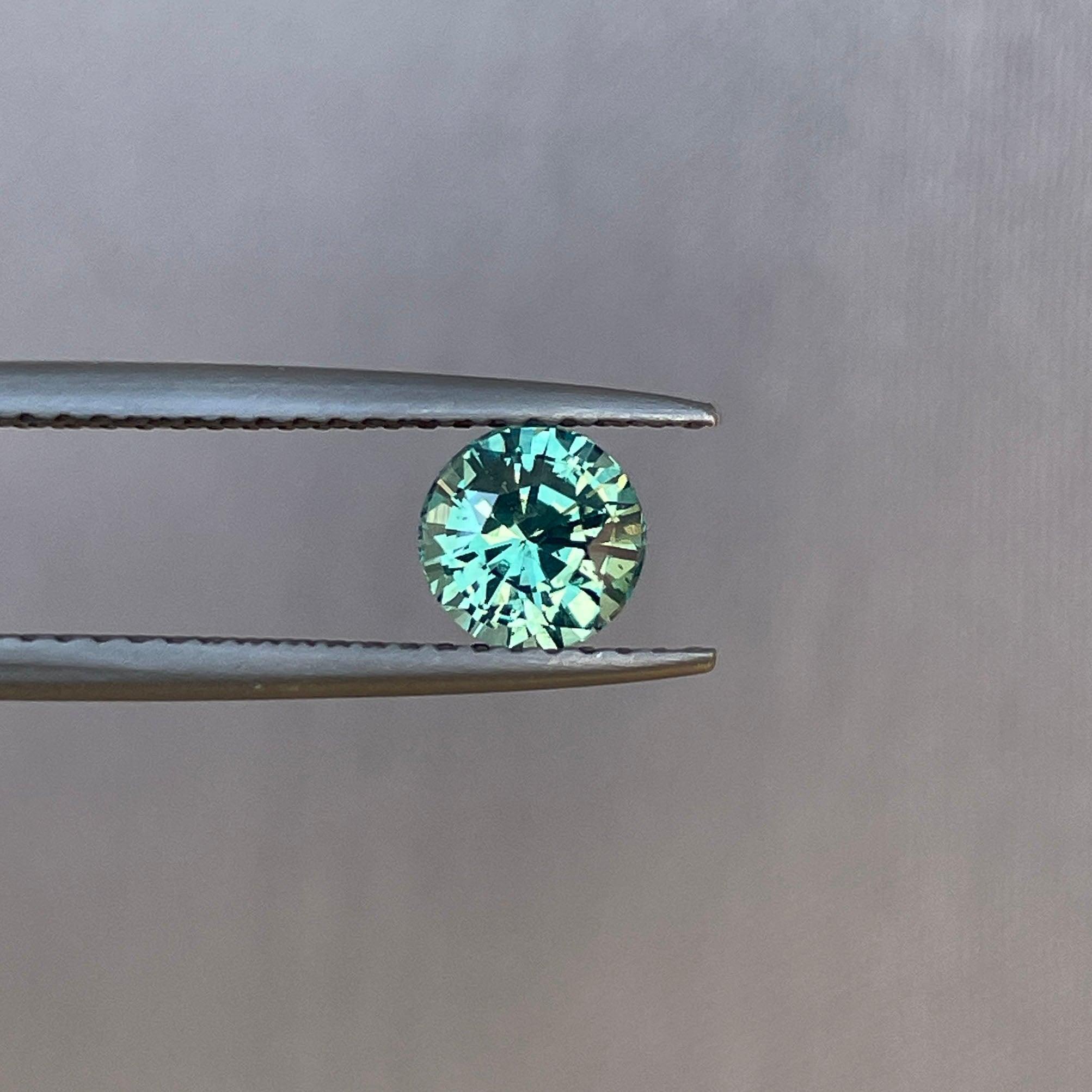 teal blue green parti sapphire round cut gem 