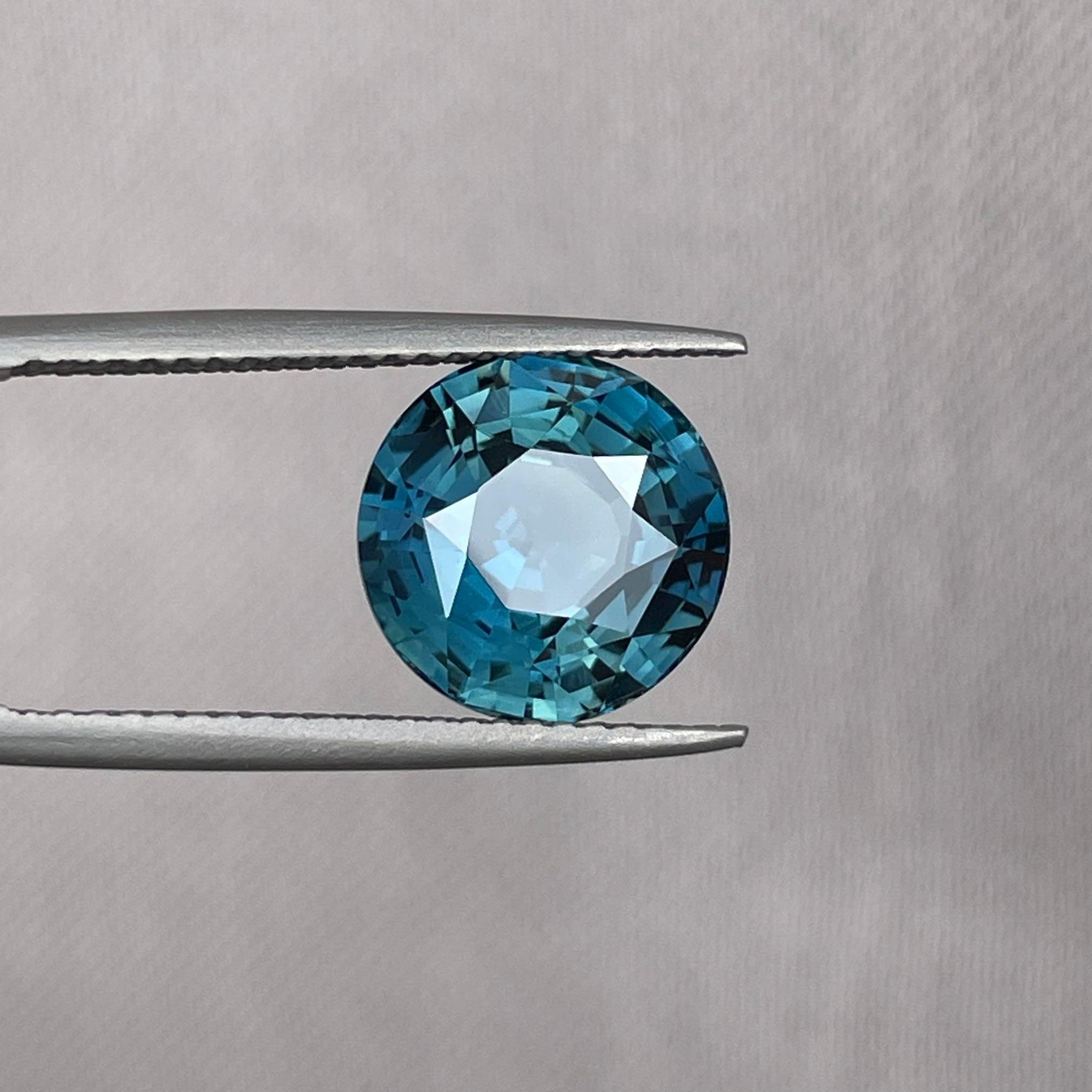 teal blue green parti sapphire round cut gem 