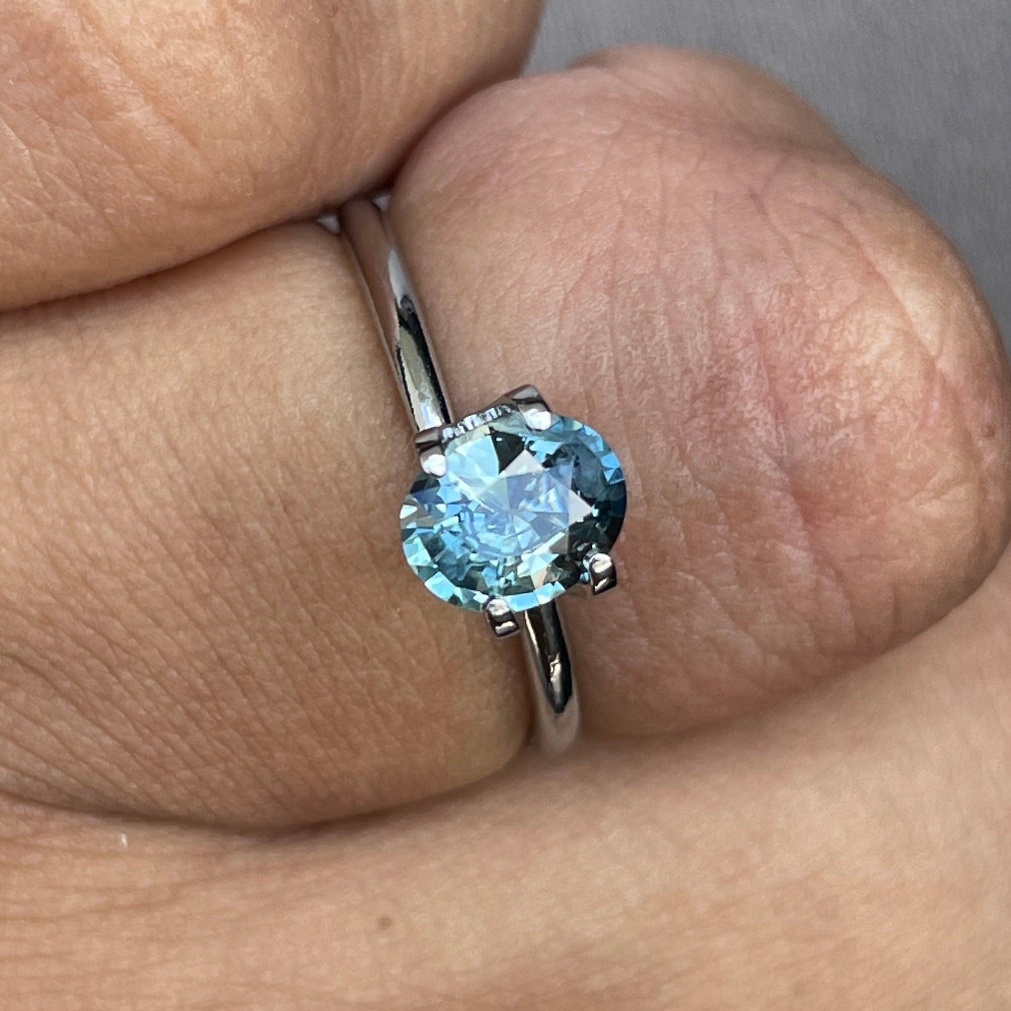 teal sapphire engagement ring