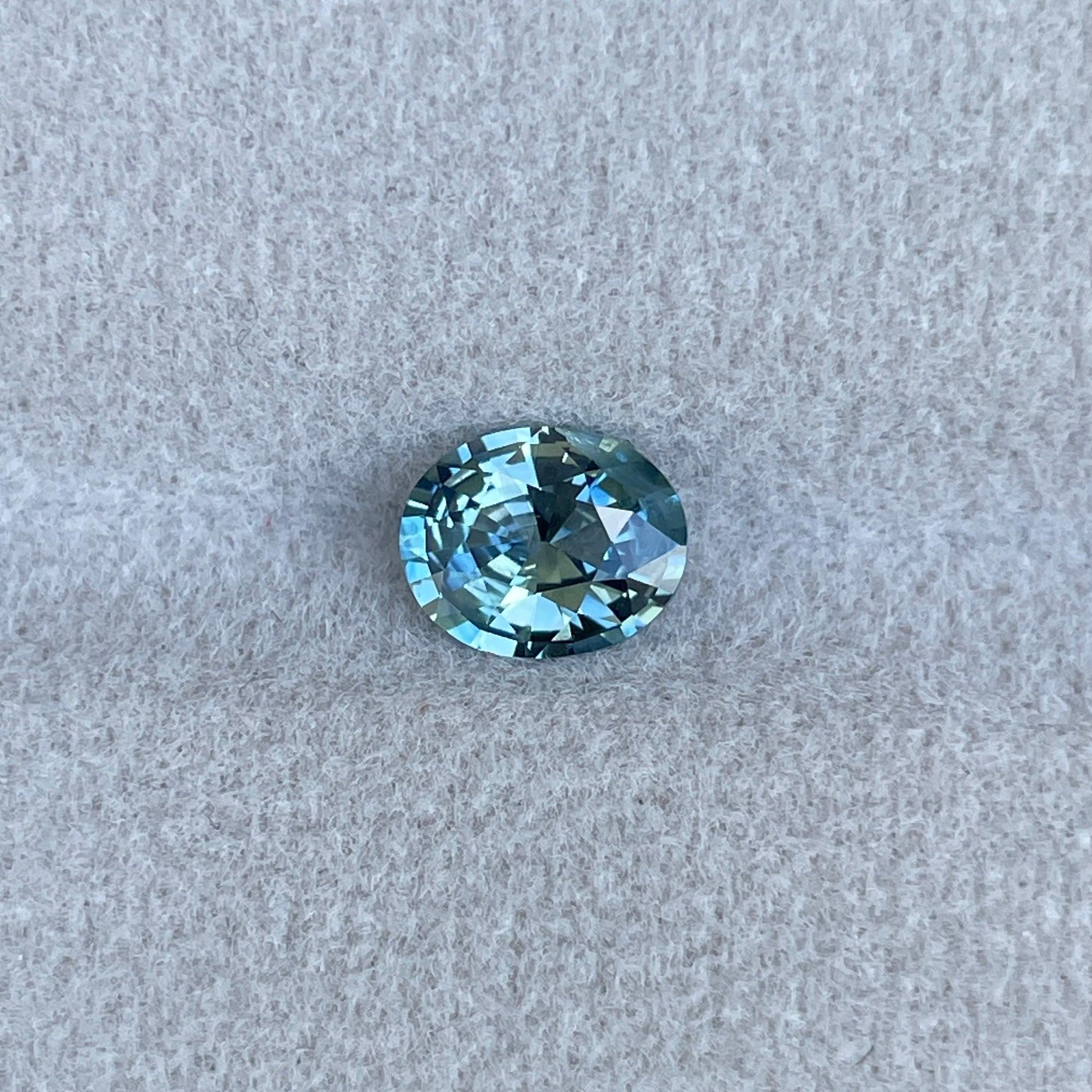 teal sapphire engagement ring