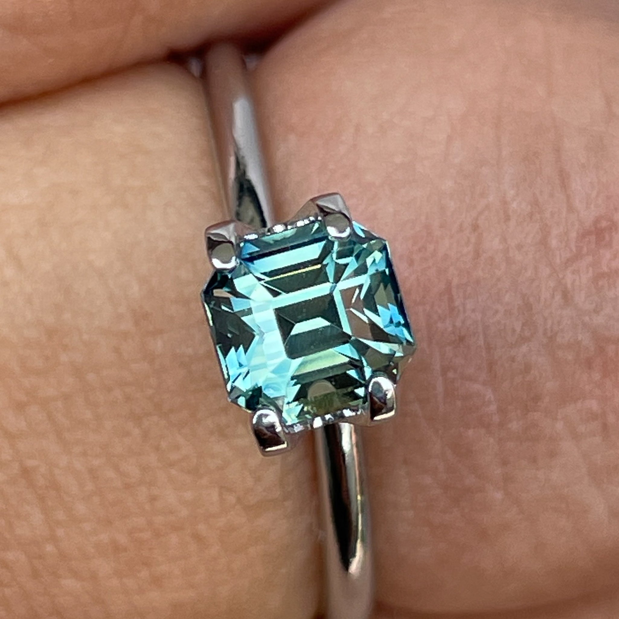 Natural teal green sapphire 1.36 Ct emerald cut by NASHGEMS, no heat loose gemstone for engagement or custom jewelry.