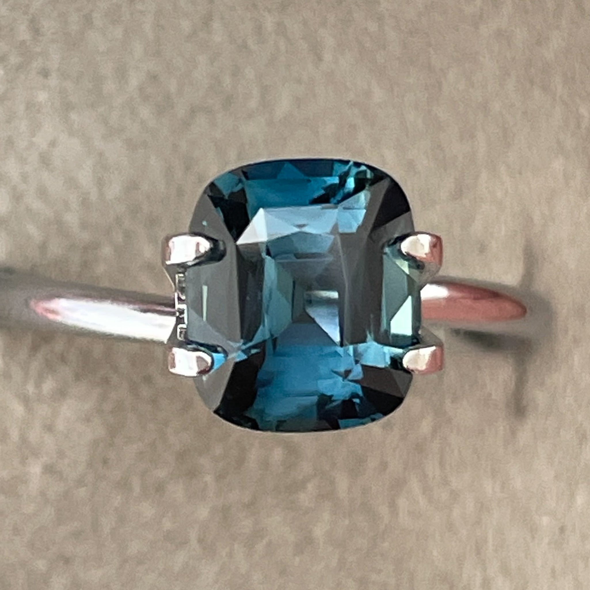 Natural teal blue sapphire 2.52 Ct cushion cut loose gemstone from NASHGEMS, ideal for engagement rings or custom jewelry.