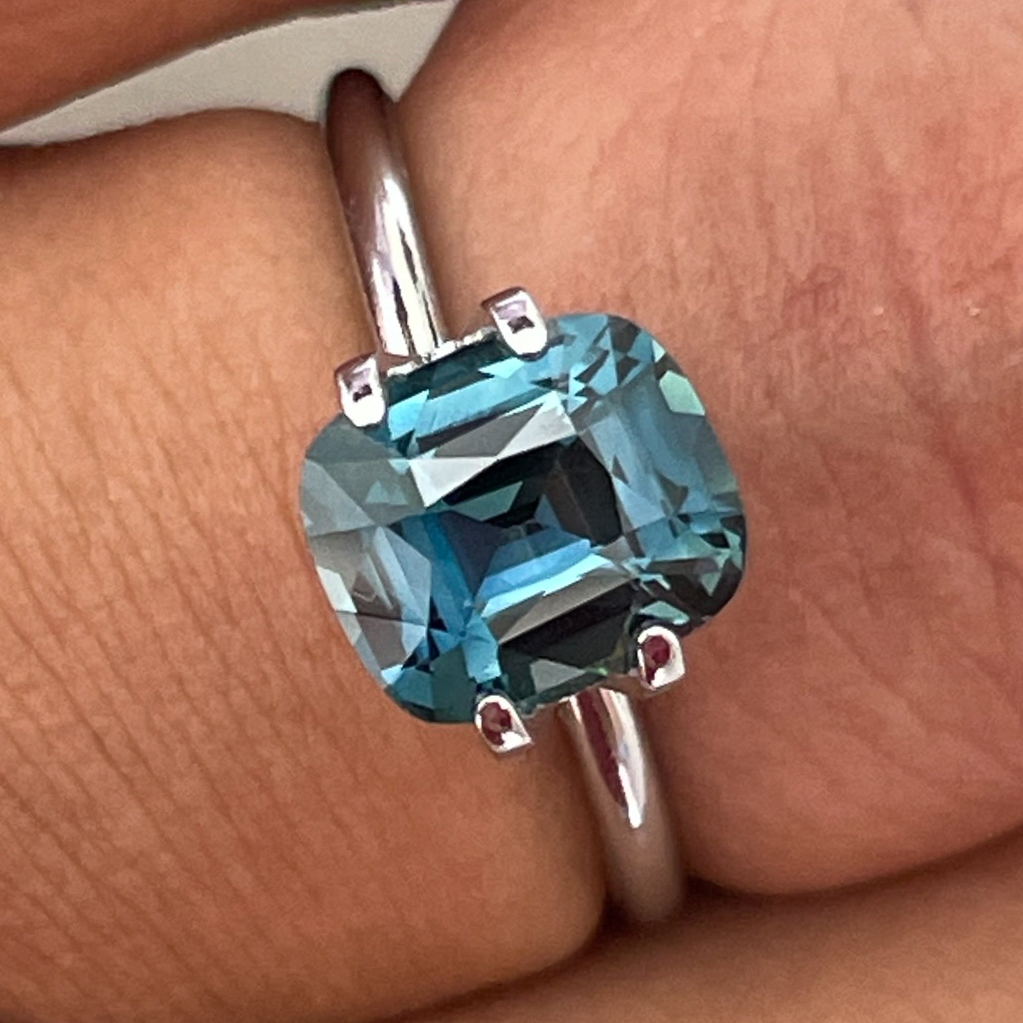 Teal blue sapphire loose gemstone, 2.52 Ct cushion cut, heat treated, perfect for engagement rings or custom jewelry from NASHGEMS.