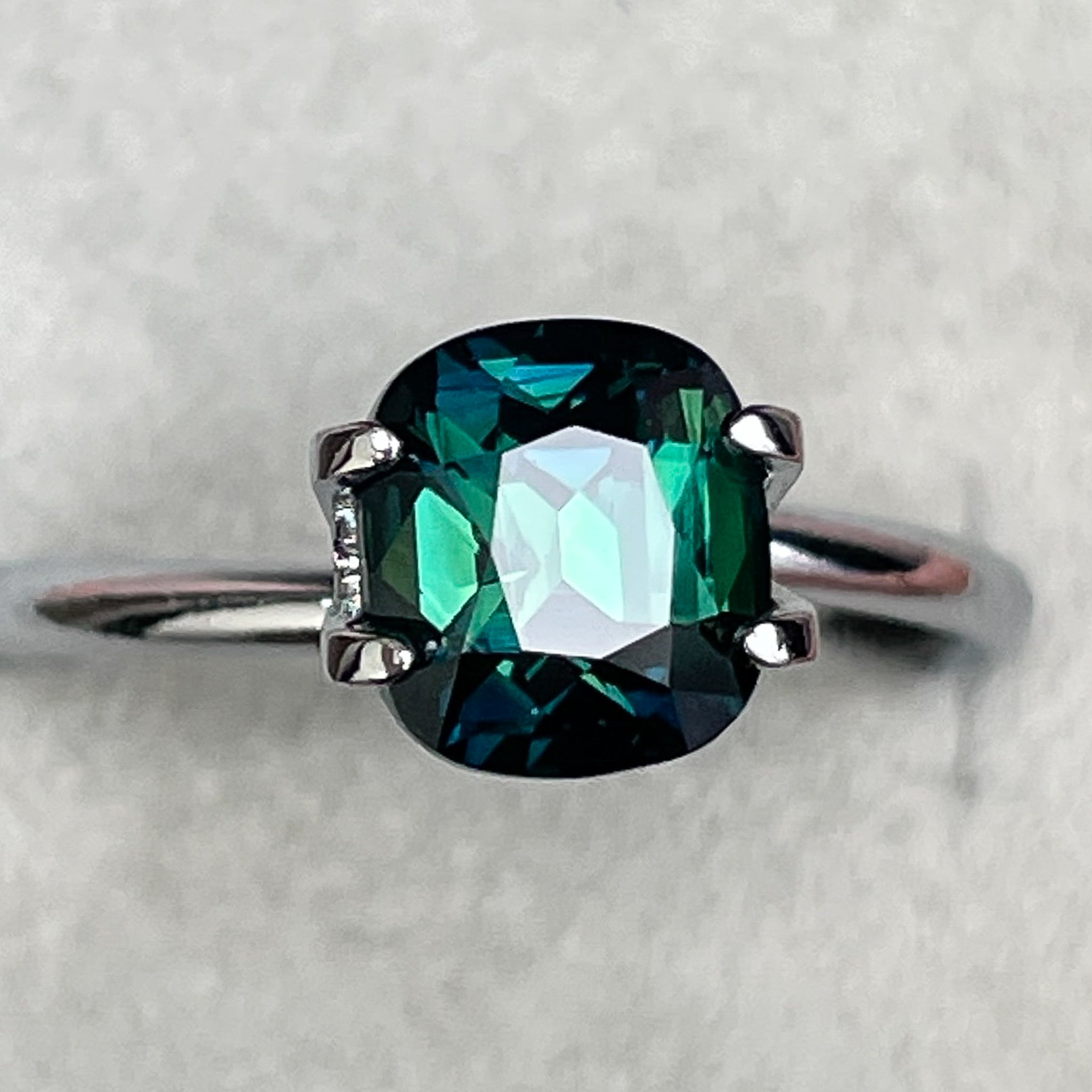Natural forest green sapphire, 2.56 Ct cushion cut loose teal sapphire from NASHGEMS for engagement or custom jewelry.