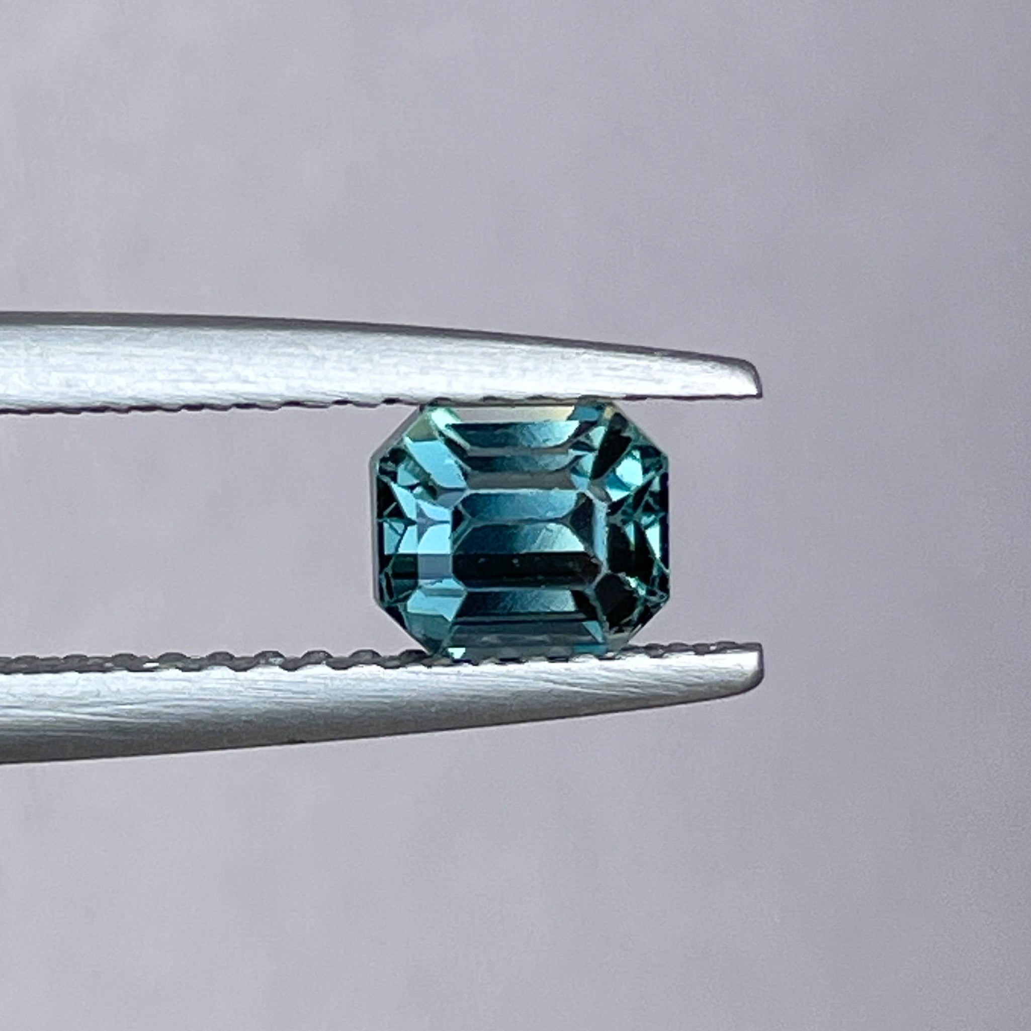 Teal blue sapphire loose gemstone, 1.00 Ct emerald cut, natural no heat sapphire by NASHGEMS for engagement or custom jewelry.