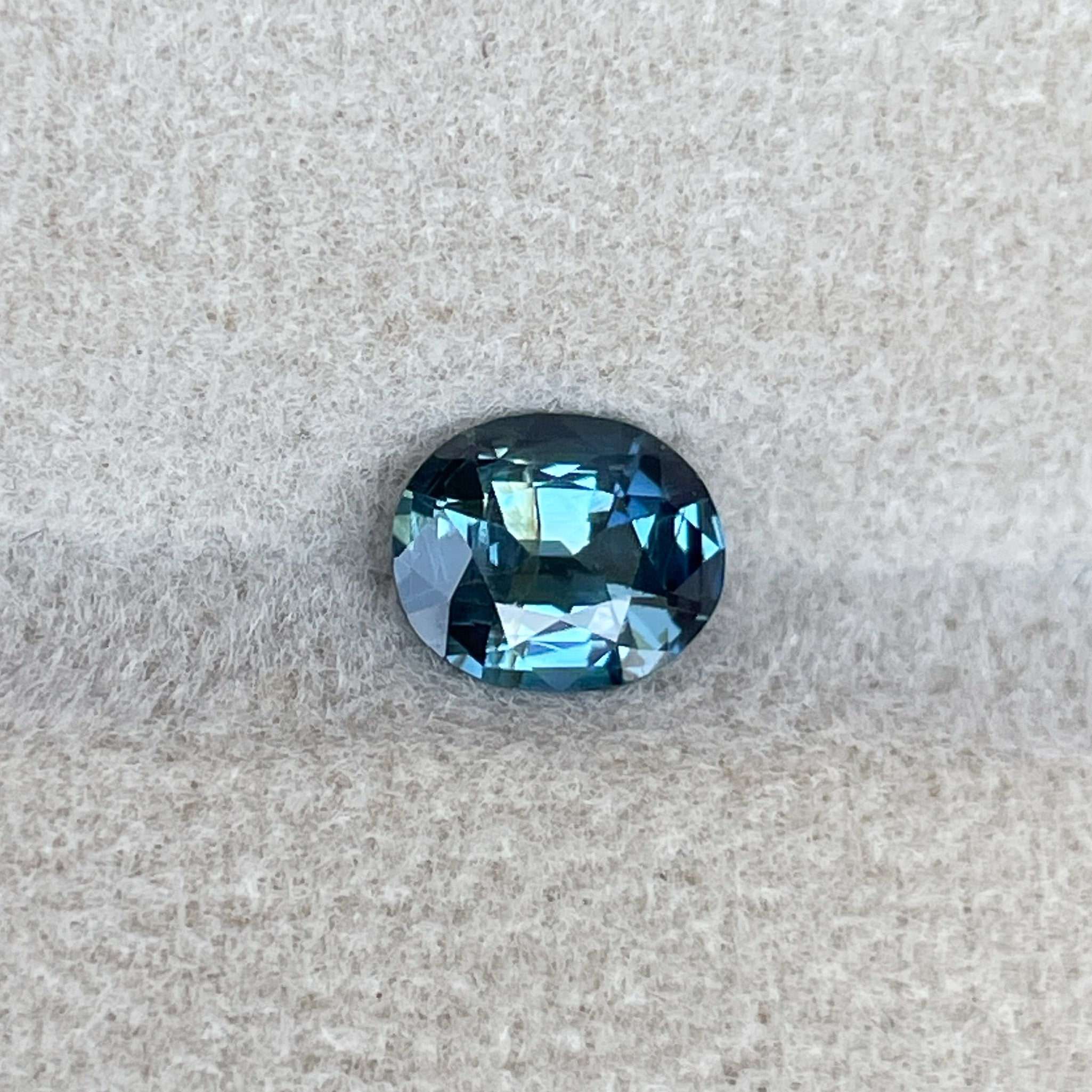 Natural teal sapphire 1.03 Ct oval cut loose gemstone from NASHGEMS, vibrant teal blue-green color for jewelry or engagement rings