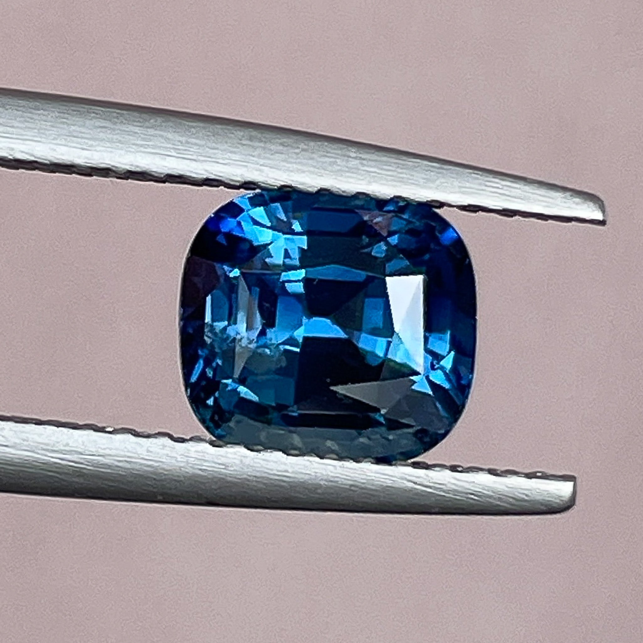 Natural teal blue sapphire, 2.07 Ct cushion cut loose gemstone from NASHGEMS, perfect for engagement rings or custom jewelry.