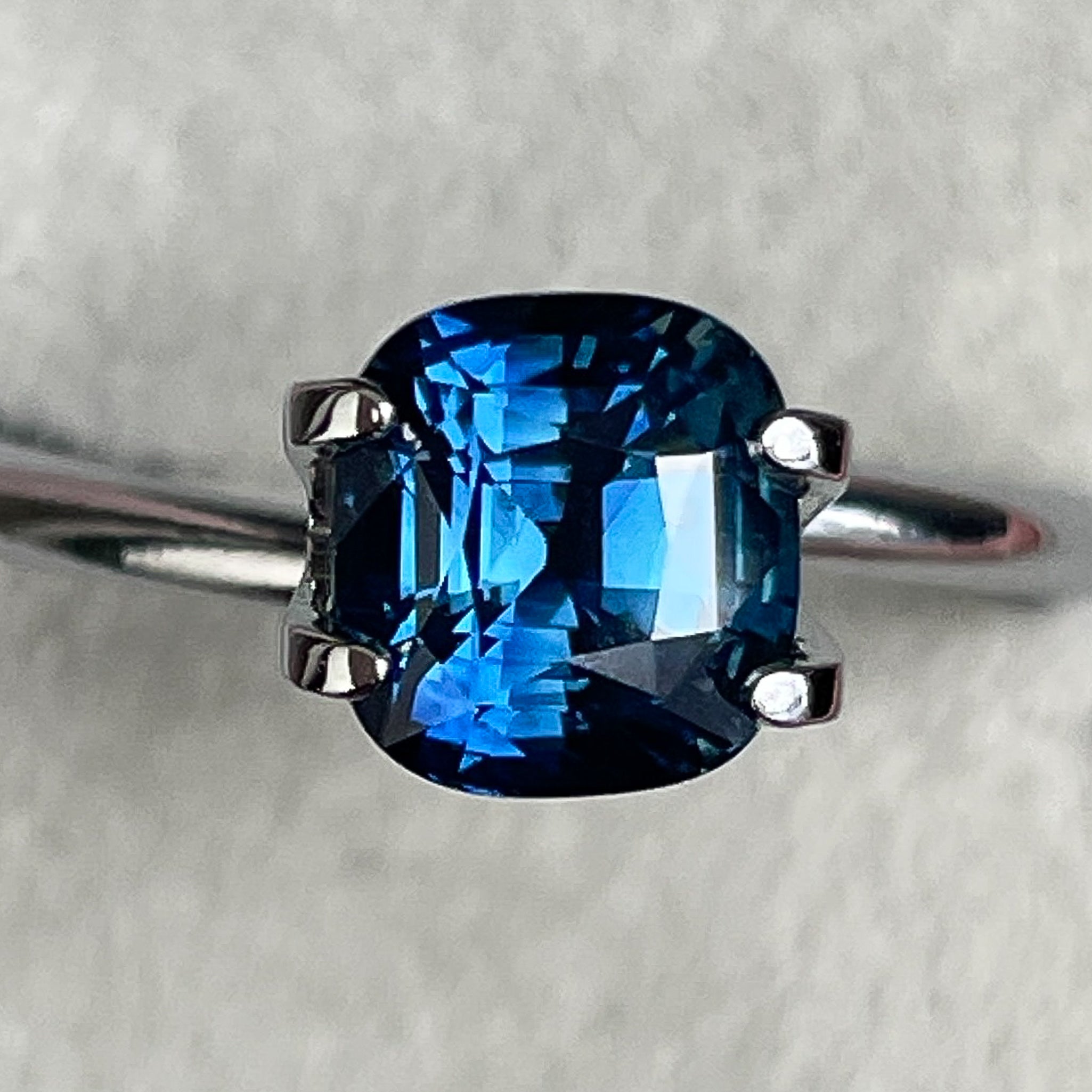 Natural teal blue sapphire, 2.07 Ct cushion cut loose gemstone by NASHGEMS, perfect for engagement rings or custom jewelry.