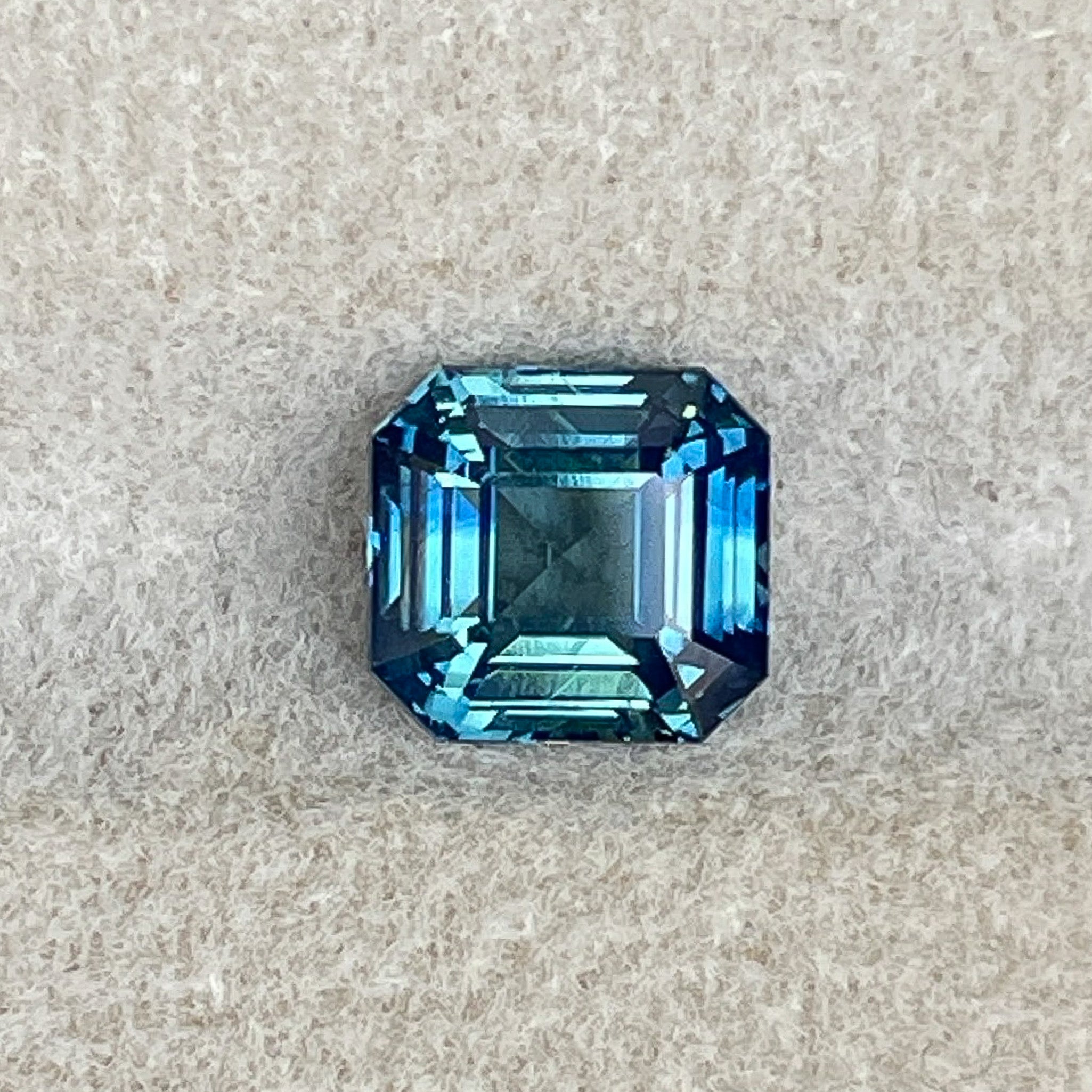 Natural teal blue-green sapphire, 1.75 ct emerald cut, no heat bi-color loose sapphire by NASHGEMS for engagement jewelry.