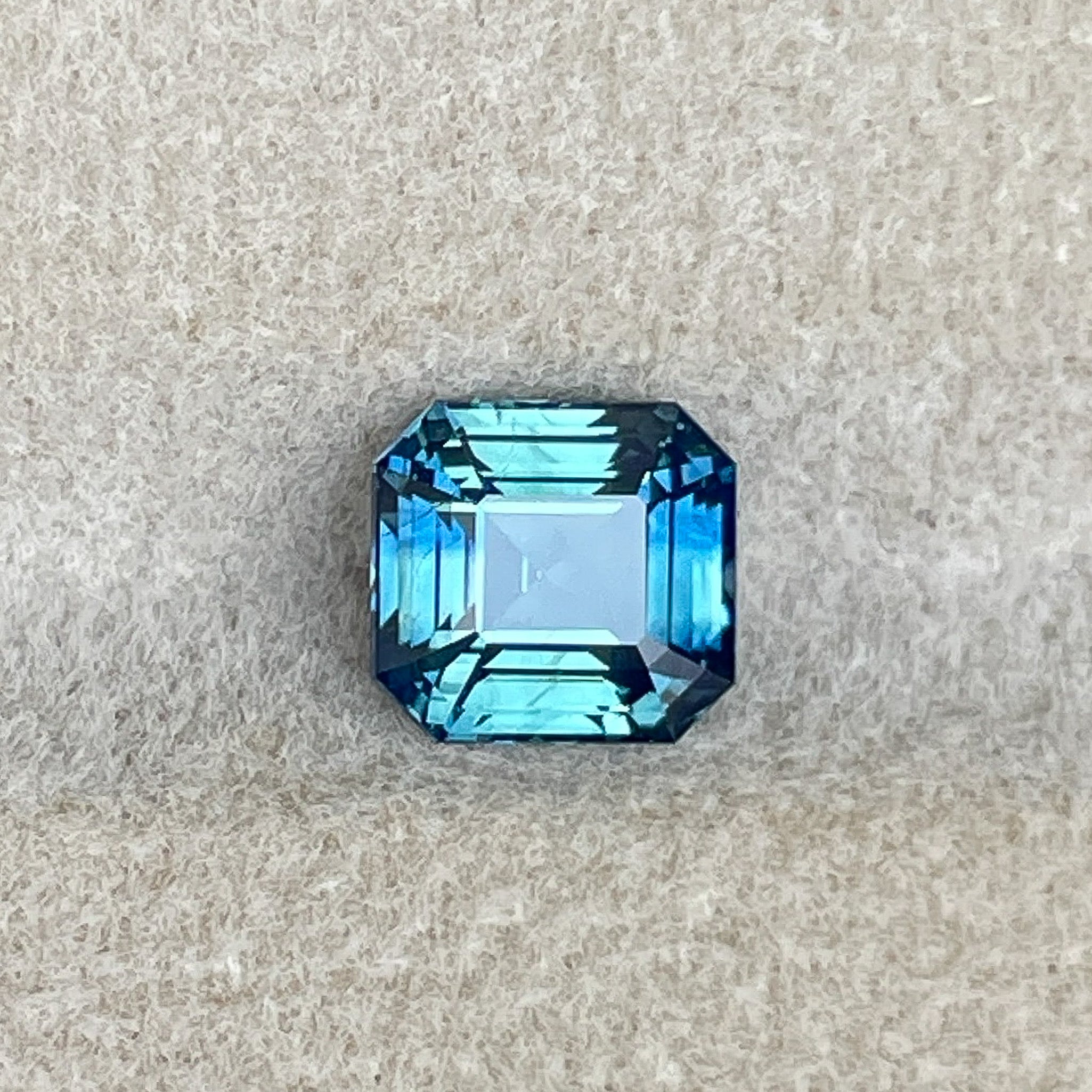 Teal blue green 1.75 Ct emerald cut natural sapphire loose gemstone by NASHGEMS, no heat, bi-color, ideal for engagement rings.