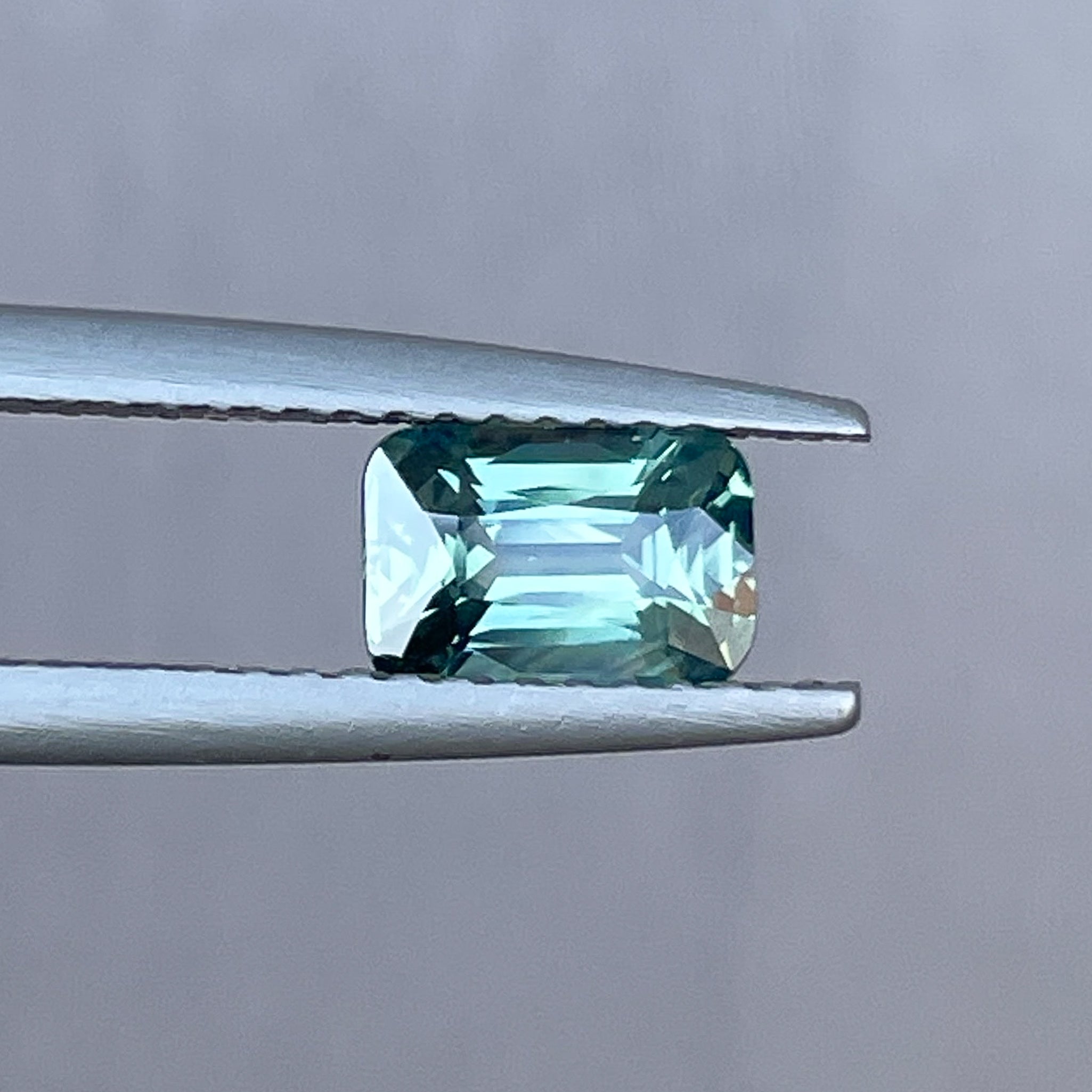 Natural pale green sapphire, 1.14 Ct cushion cut loose teal sapphire by NASHGEMS for engagement or custom jewelry.