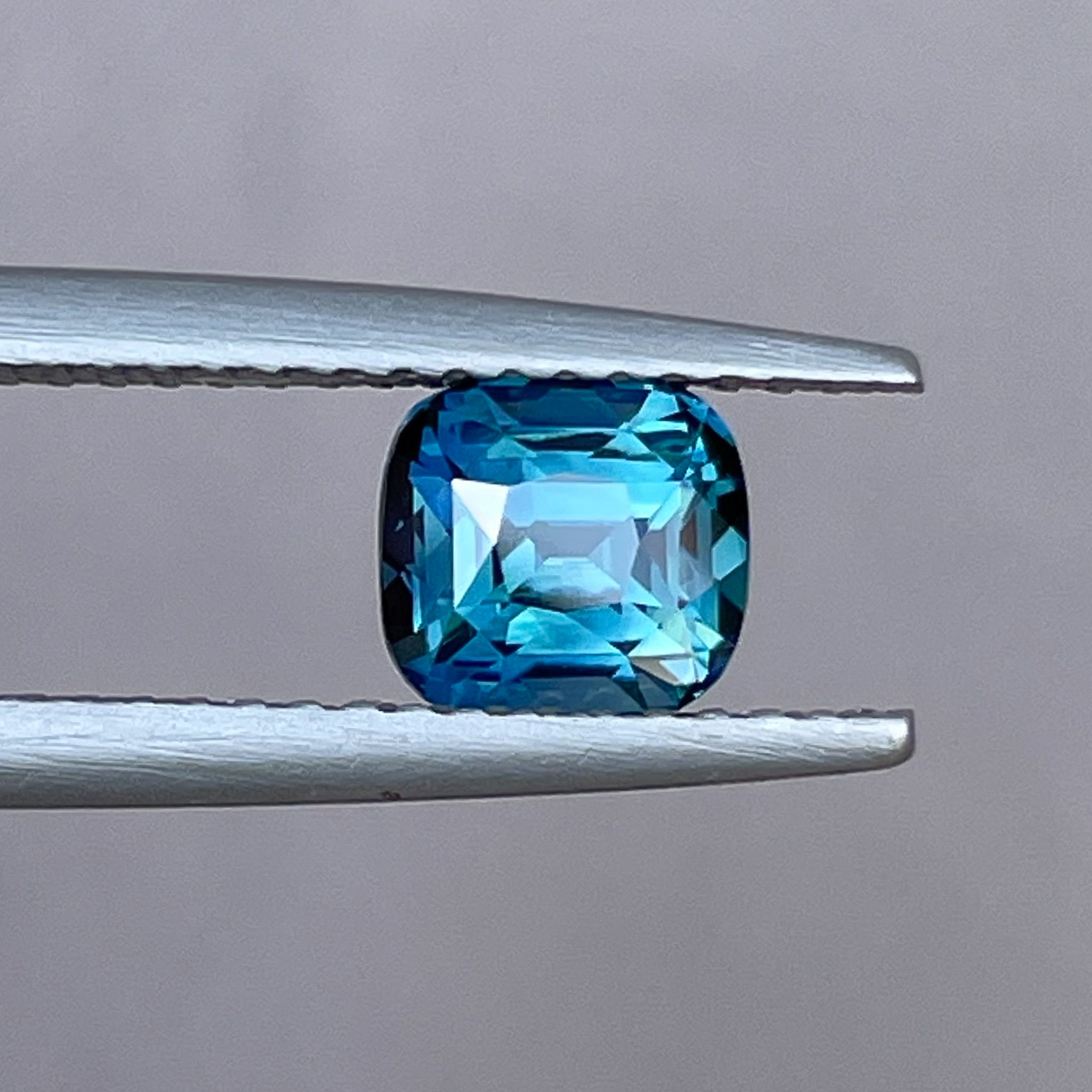 Natural teal blue sapphire loose stone, 1.52 Ct cushion cut, no heat, suitable for engagement rings or custom jewelry by NASHGEMS.