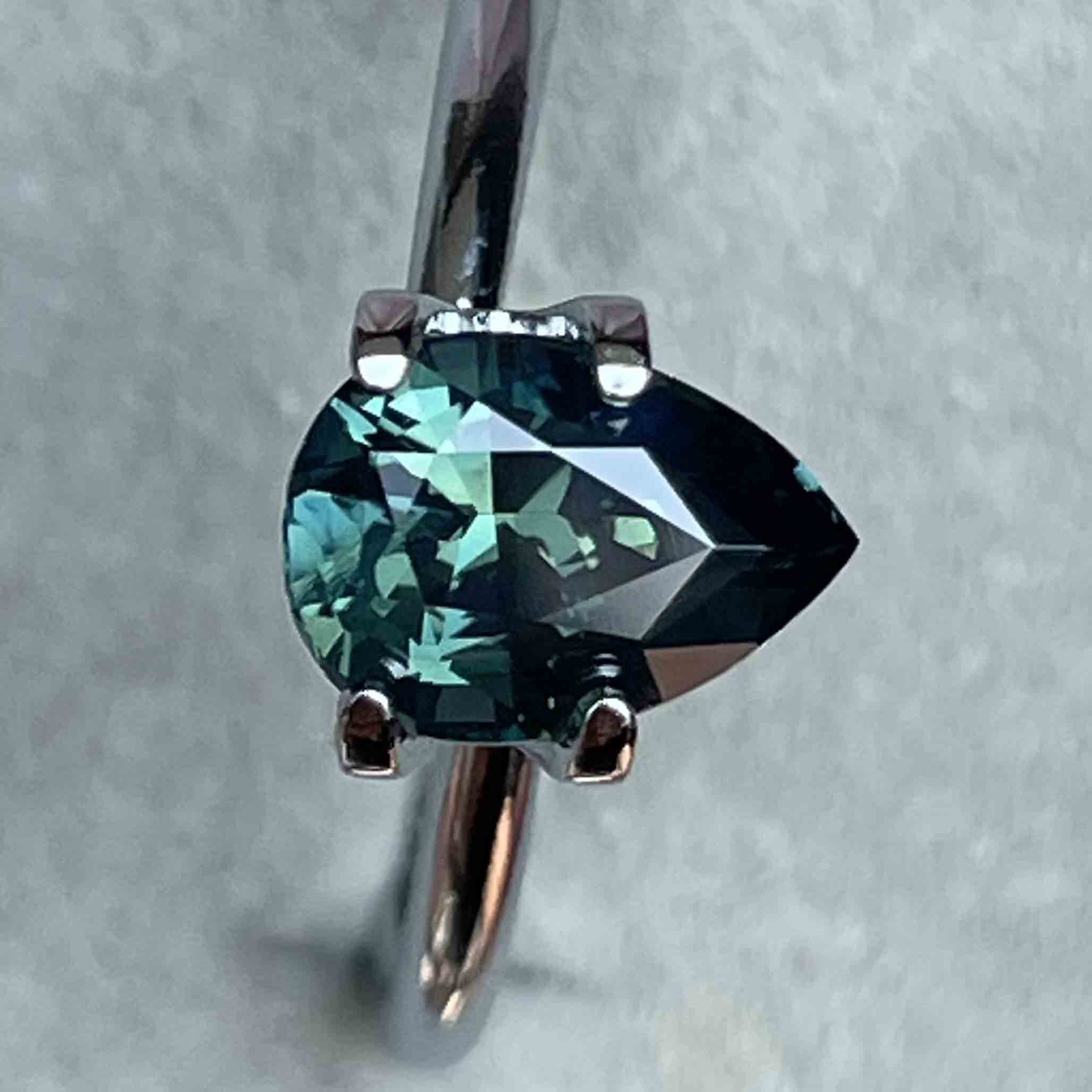 Natural teal blue green sapphire, 1.57 Ct pear-shaped loose gemstone by NASHGEMS, ideal for custom engagement rings.