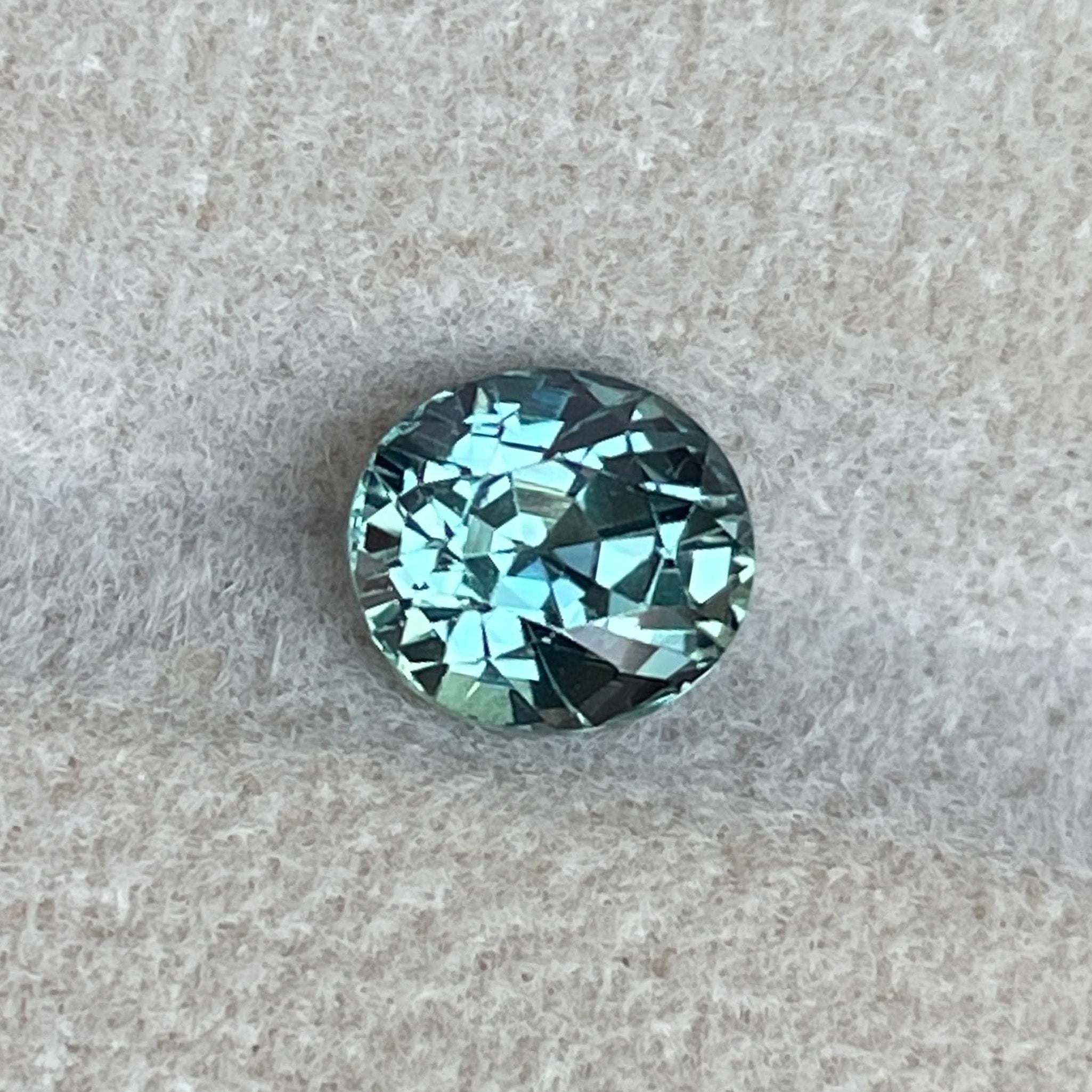 Natural teal sapphire loose stone, 1.65 Ct oval cut, no heat, ideal for engagement rings or custom jewelry by NASHGEMS.