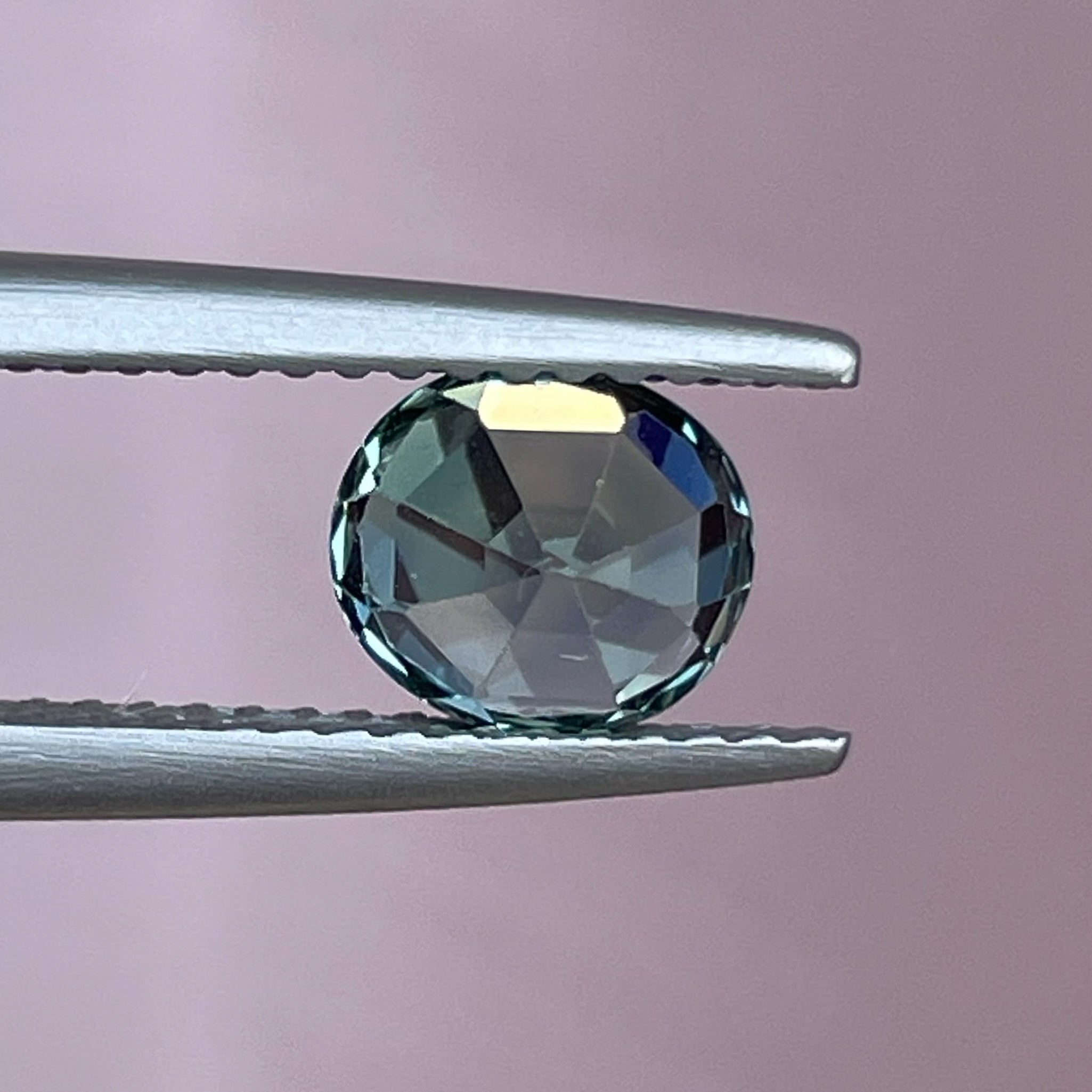 Natural teal sapphire loose gemstone, 1.65 ct oval cut by NASHGEMS, ideal for engagement rings or custom jewelry designs.