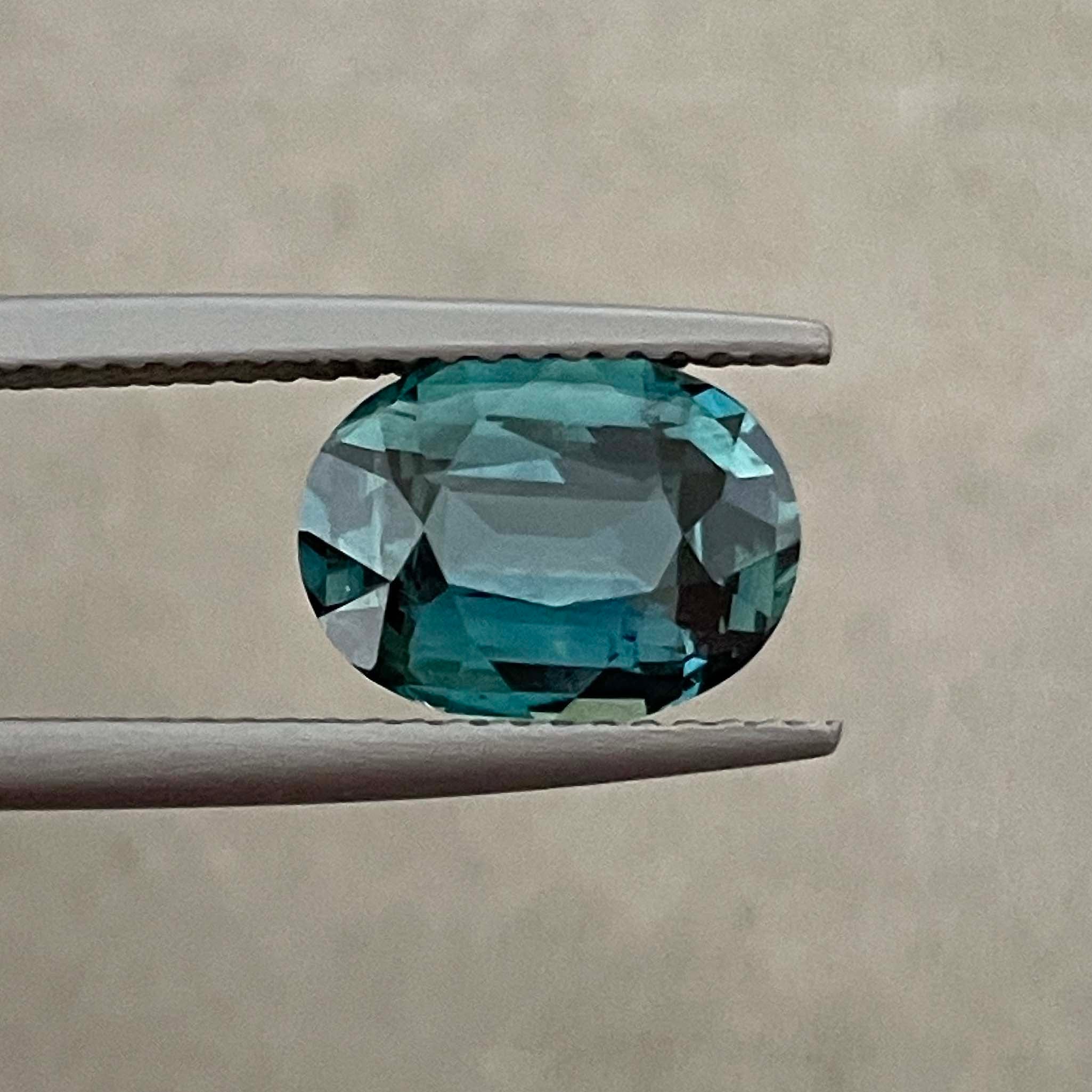 Natural teal blue green sapphire, 3.19 ct oval loose gemstone by NASHGEMS, ideal for engagement rings or custom jewelry.