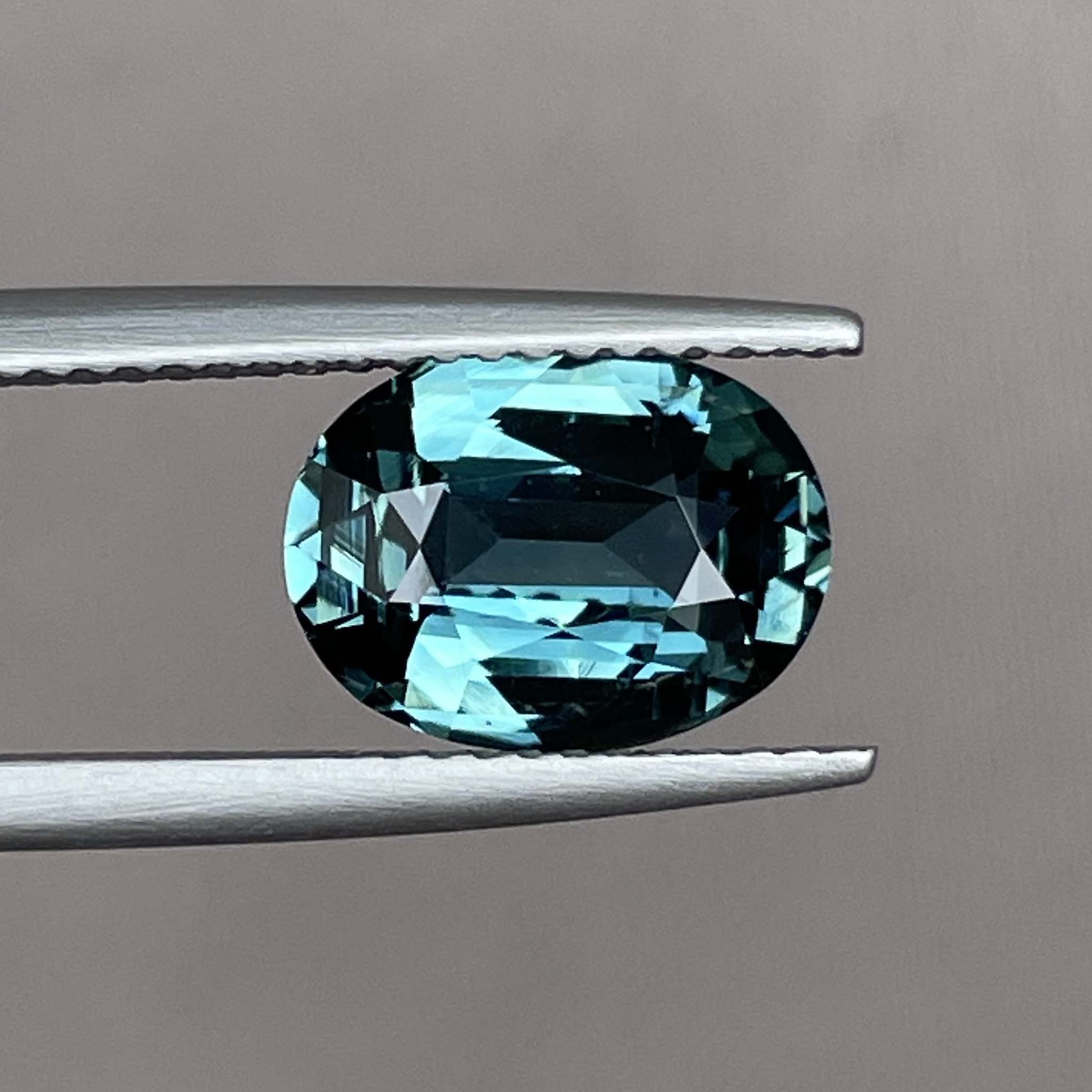 Natural teal blue green sapphire, 3.19 Ct oval loose gemstone by NASHGEMS, perfect for engagement or custom jewelry.