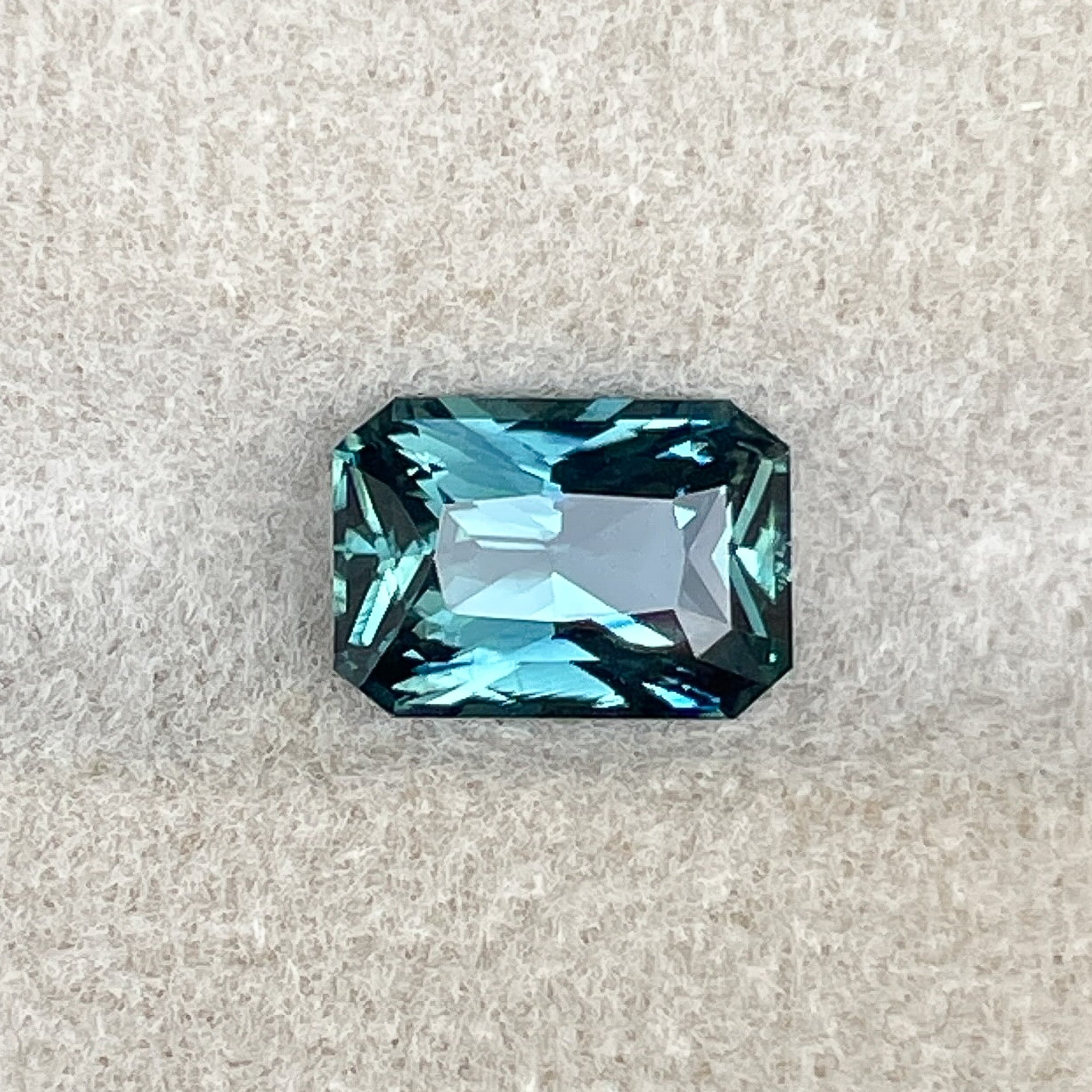 Natural teal blue green sapphire, 1.71 ct radiant cut, loose no heat sapphire by NASHGEMS for engagement or custom jewelry.
