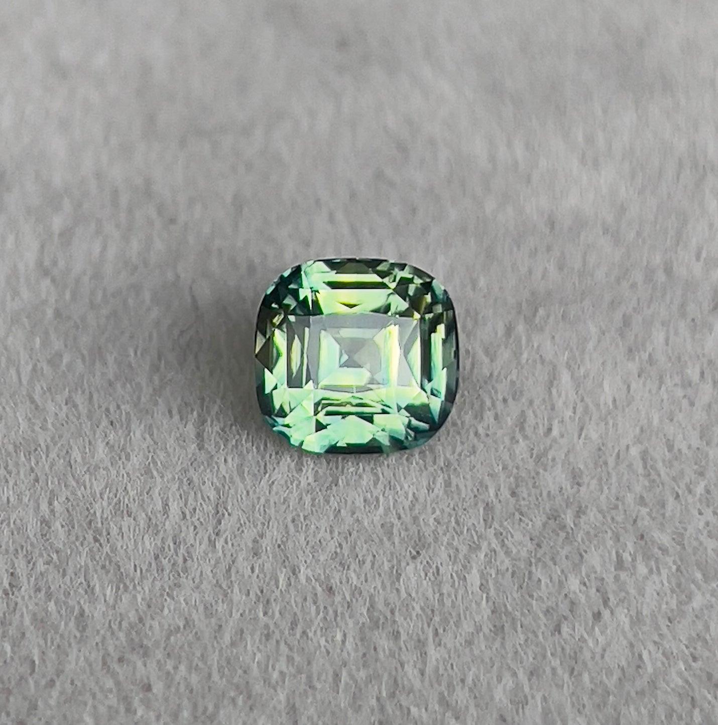 teal blue green parti sapphire cushion cut gem 