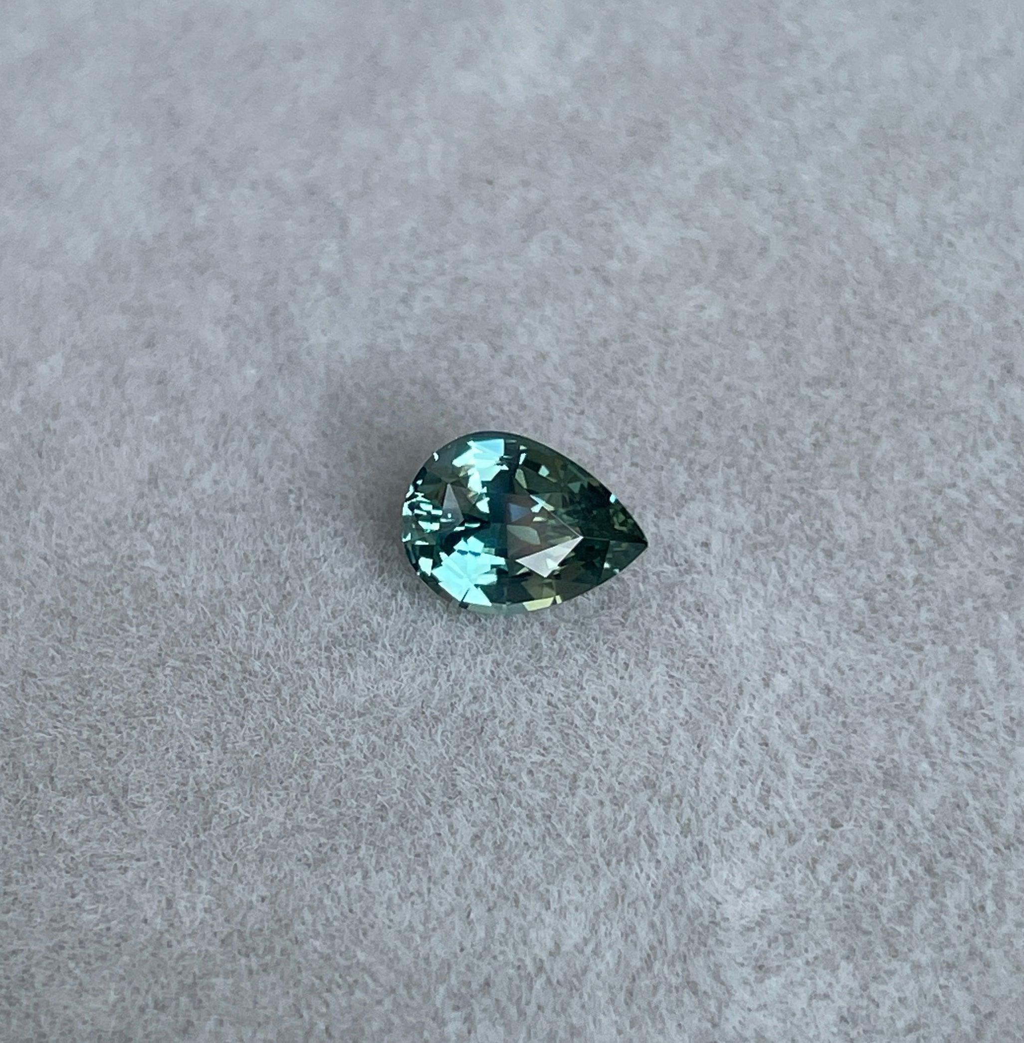 teal blue green parti sapphire pear drop cut gem 