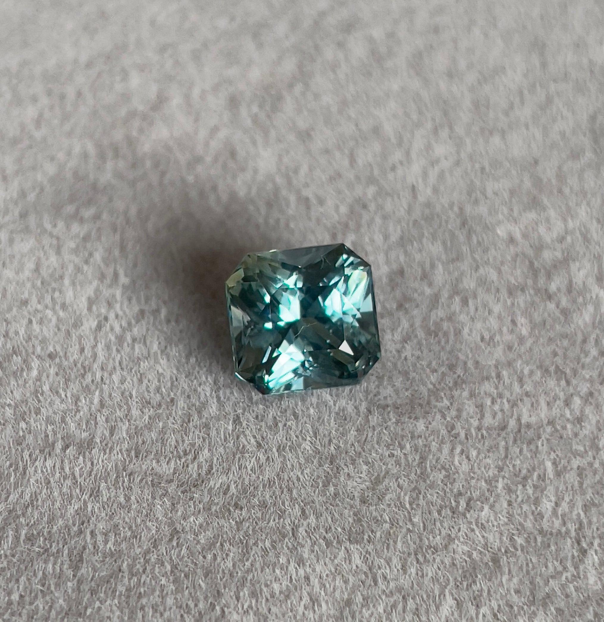 teal sapphire engagement rings